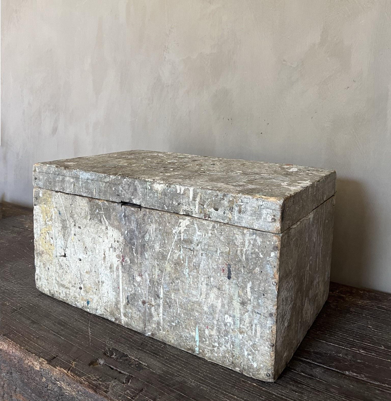 This 19th century painters box has centuries of patina. Layers and layers of paintresidues, scratches and handling has transformed this utilitary item to a intriguing object. Its structure and colors are like unintentional abstract artworks. One