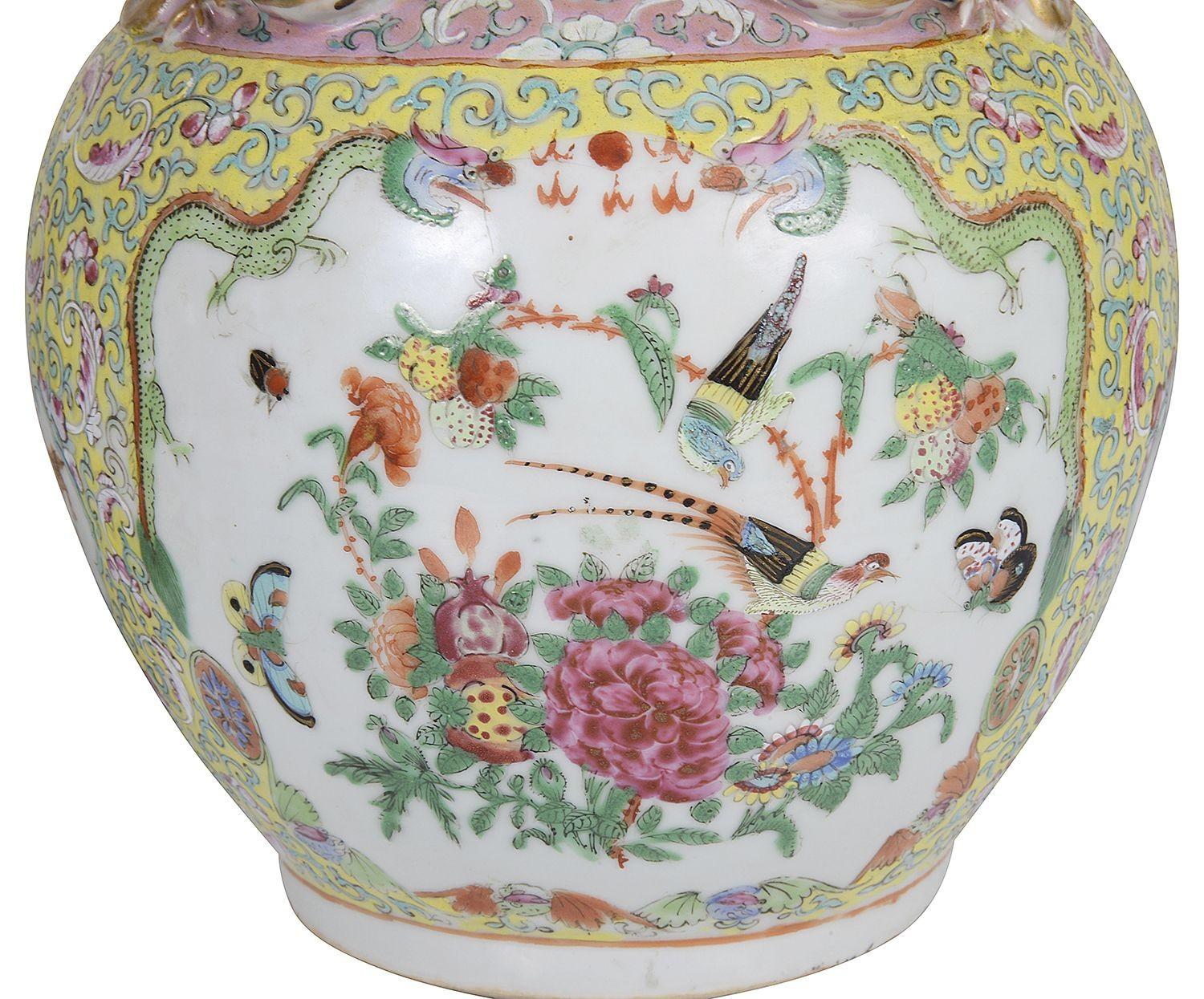 A wonderful quality and unusual colour pair of 19th Century Chinese Rose medallion porcelain vases / lamps. Having this rare yellow ground with the classical Cantonese floral decoration, exotic birds and mythical gilded serpent handles. This pair of