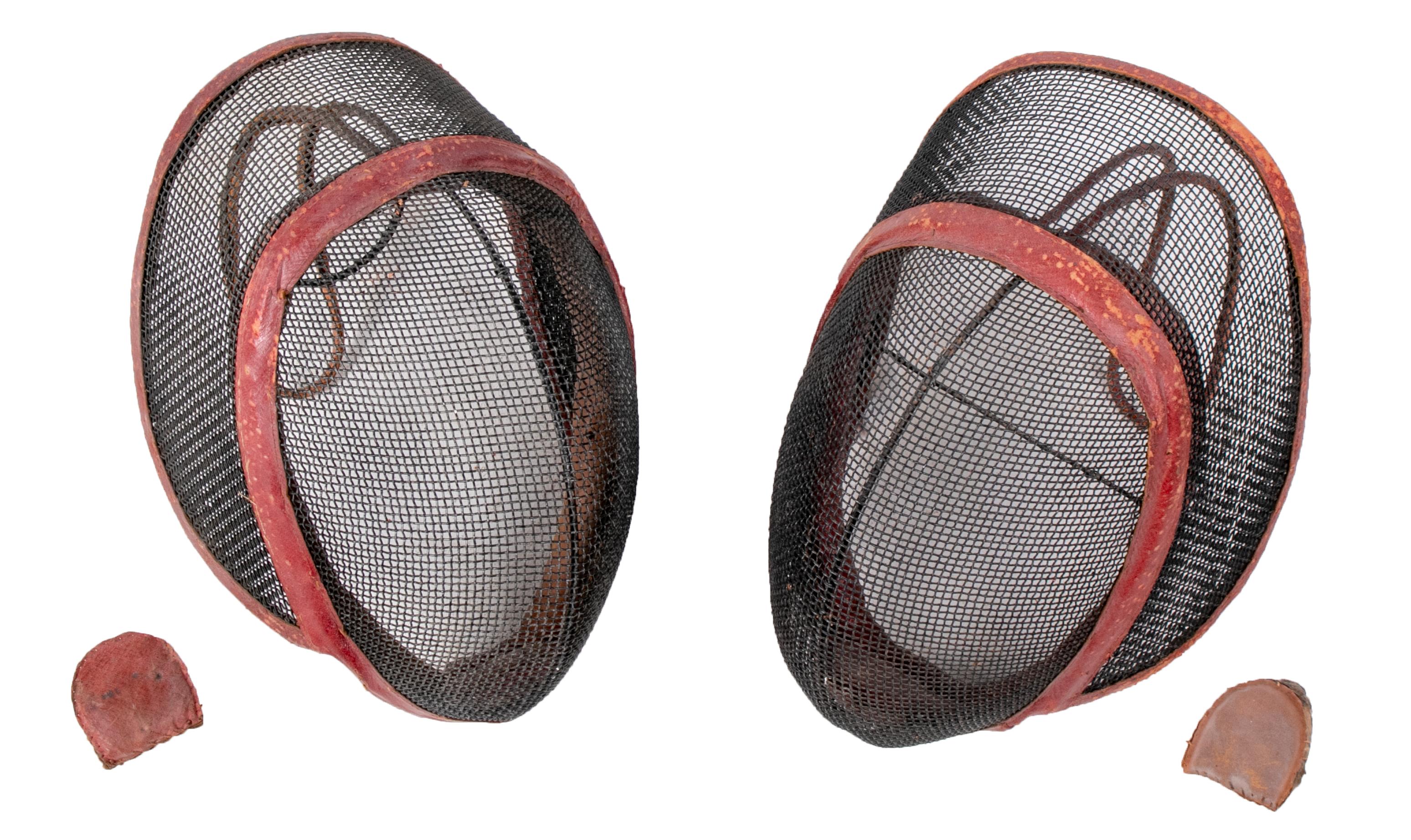 19th century pair of antique iron and leather fencing mesh mask.