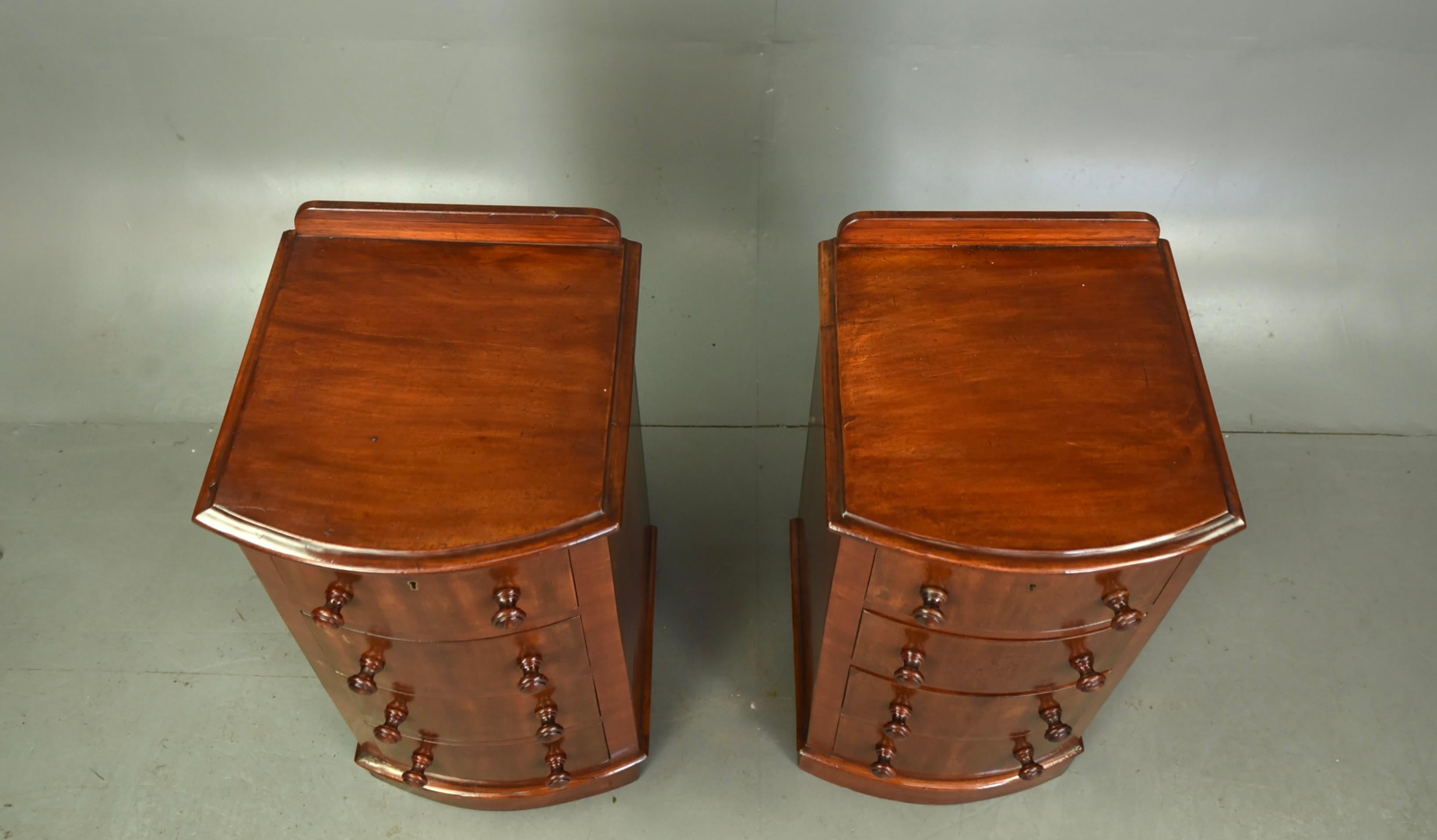 19th century pair of bow front bedside chests of drawers 1