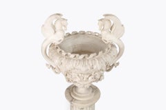 19th century pair of carved alabaster urns on pedestals