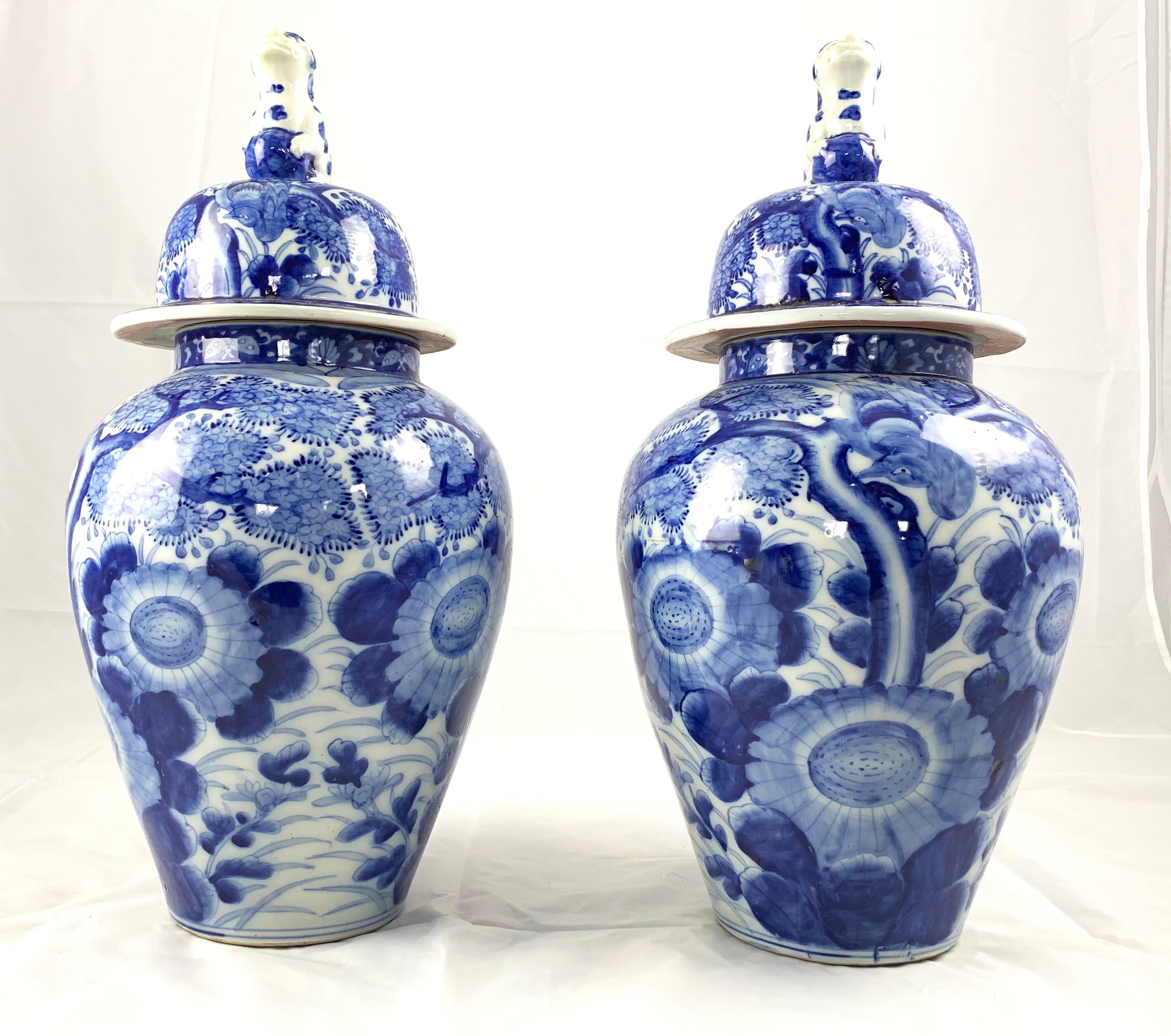 Hand-Painted Late 20th Century Pair of Chinese Blue and White Vases and Covers