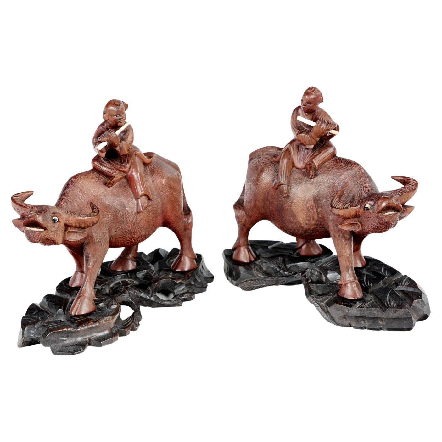 19th Century Pair of Chinese Hardwood Buffalo & Boys with Bone Flutes For Sale