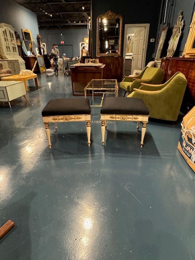 Lovely pair of Danish carved and painted benches by Jorgen Hansen Koch. Featuring a lovely floral pattern in a gold gilt and upholstered in a gray fabric. Note: There are 2 set available. Adds a real touch of elegance. Circa 1890
20w x 20d x 19h