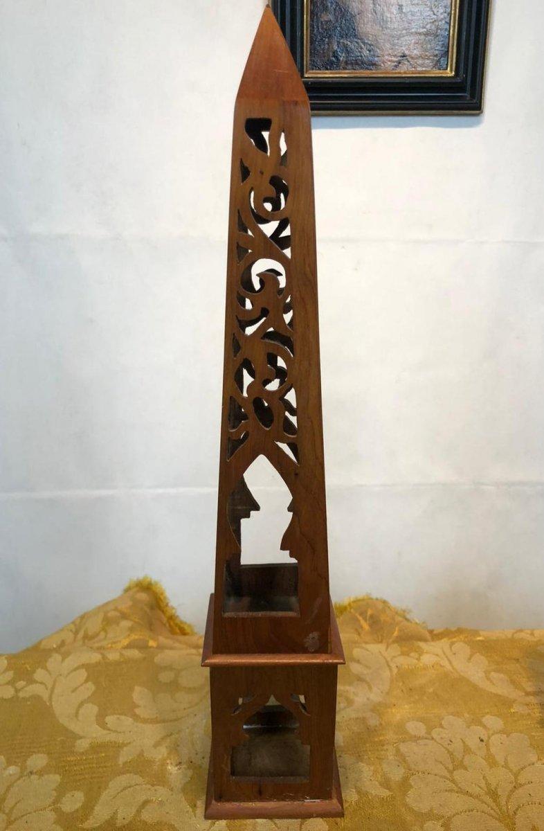 Pair of decorative obelisks in solid cherry pair of decorative obelisks in solid pair of decorative obelisks entirely made of solid perforated cherrywood, 20th century.

Dimensions: Height 48 cm, base 9 cm x 9 cm

A certificate of authenticity