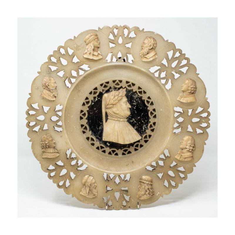 19th century 
Pair of desks with portraits of Petrarch and Leonardo
(2) Alabaster, 34 and 35 cm diam

The pair of alabaster discs features a central cameo with the effigy of Petrarch and Leonardo, probably part of a larger series that featured