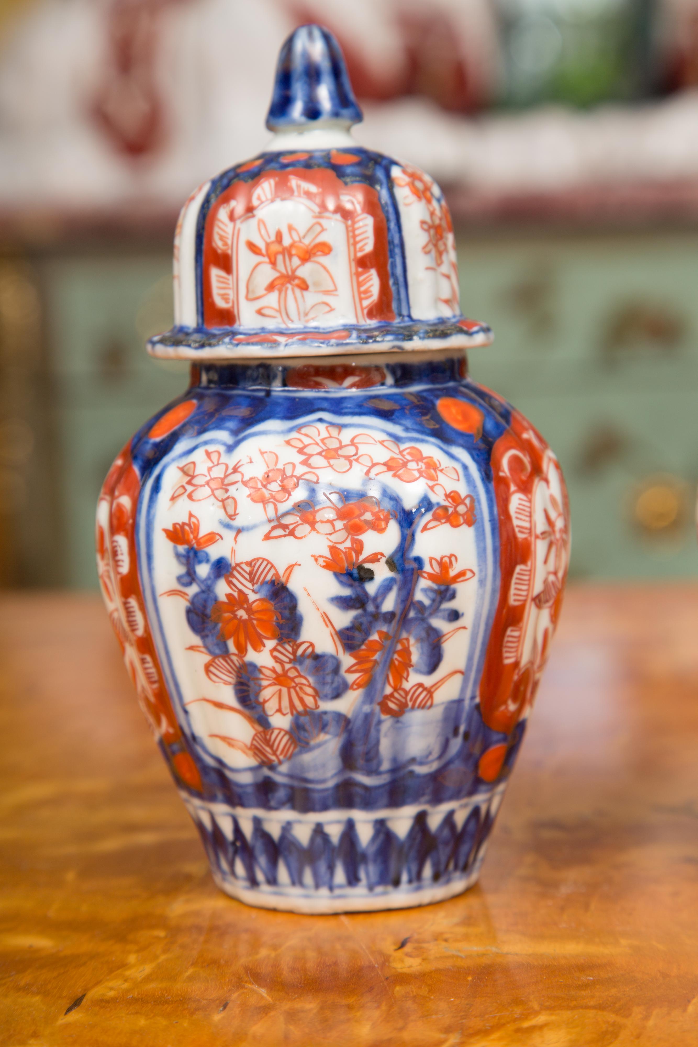 Ceramic 19th Century Pair of Diminutive Imari Lidded Urns For Sale