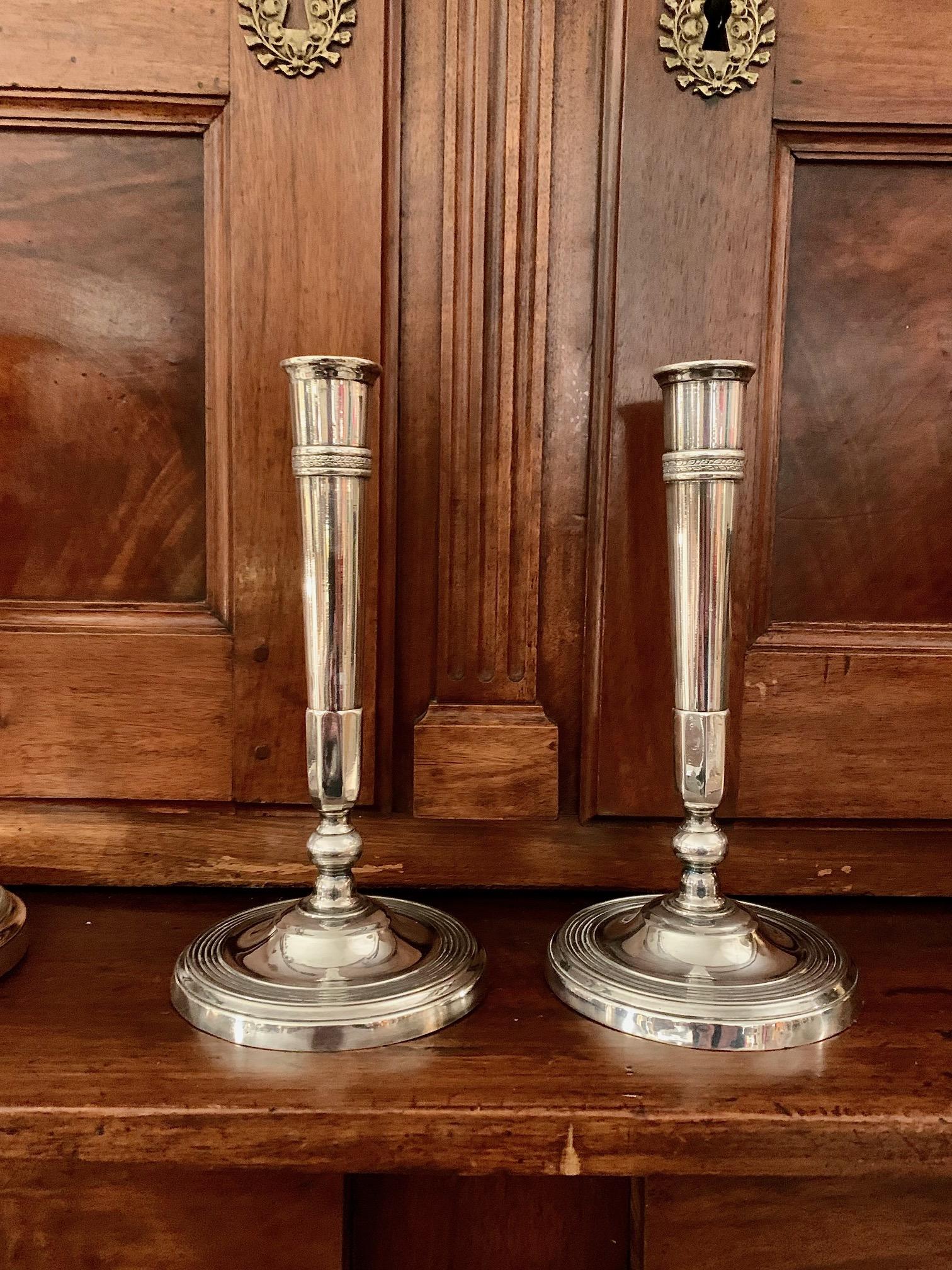 French 19th Century Pair of Directoire Silver metal
 Bronze Directoire Candlesticks For Sale