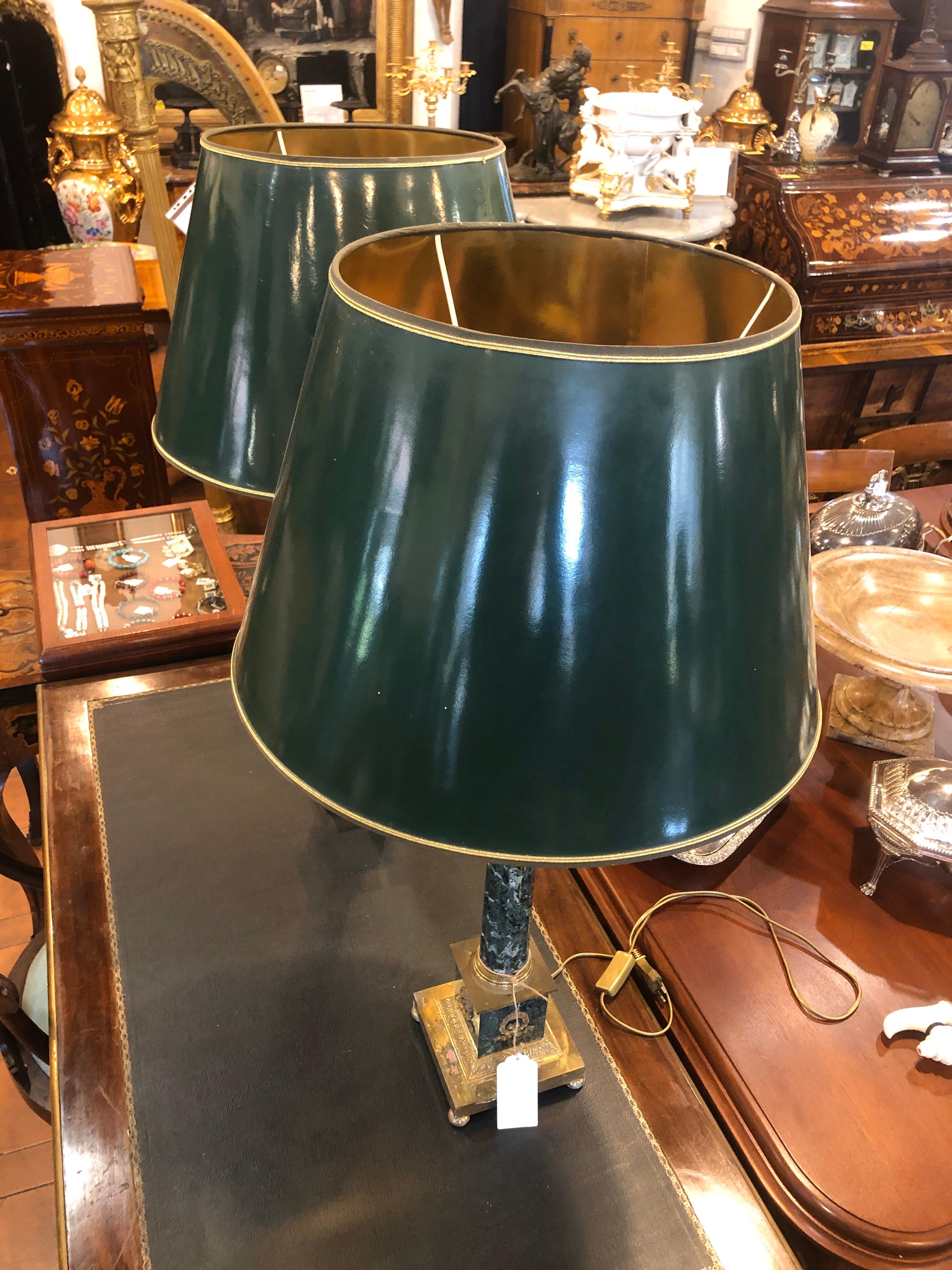 Pair of French lamps, late Napoleon III °, in alps green marble, finely carved on the column, golden bronze applications of excellent workmanship. The lamps were electrified later to adapt to Modern Times, the hats are in good condition, some small