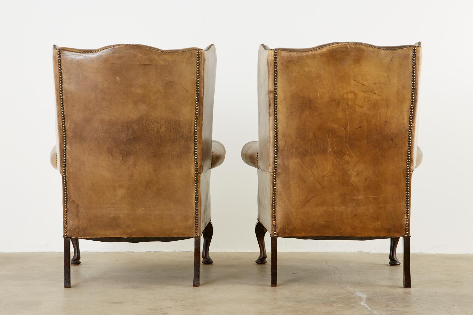 19th Century Pair of English Cigar Leather Wingback Library Chairs 9