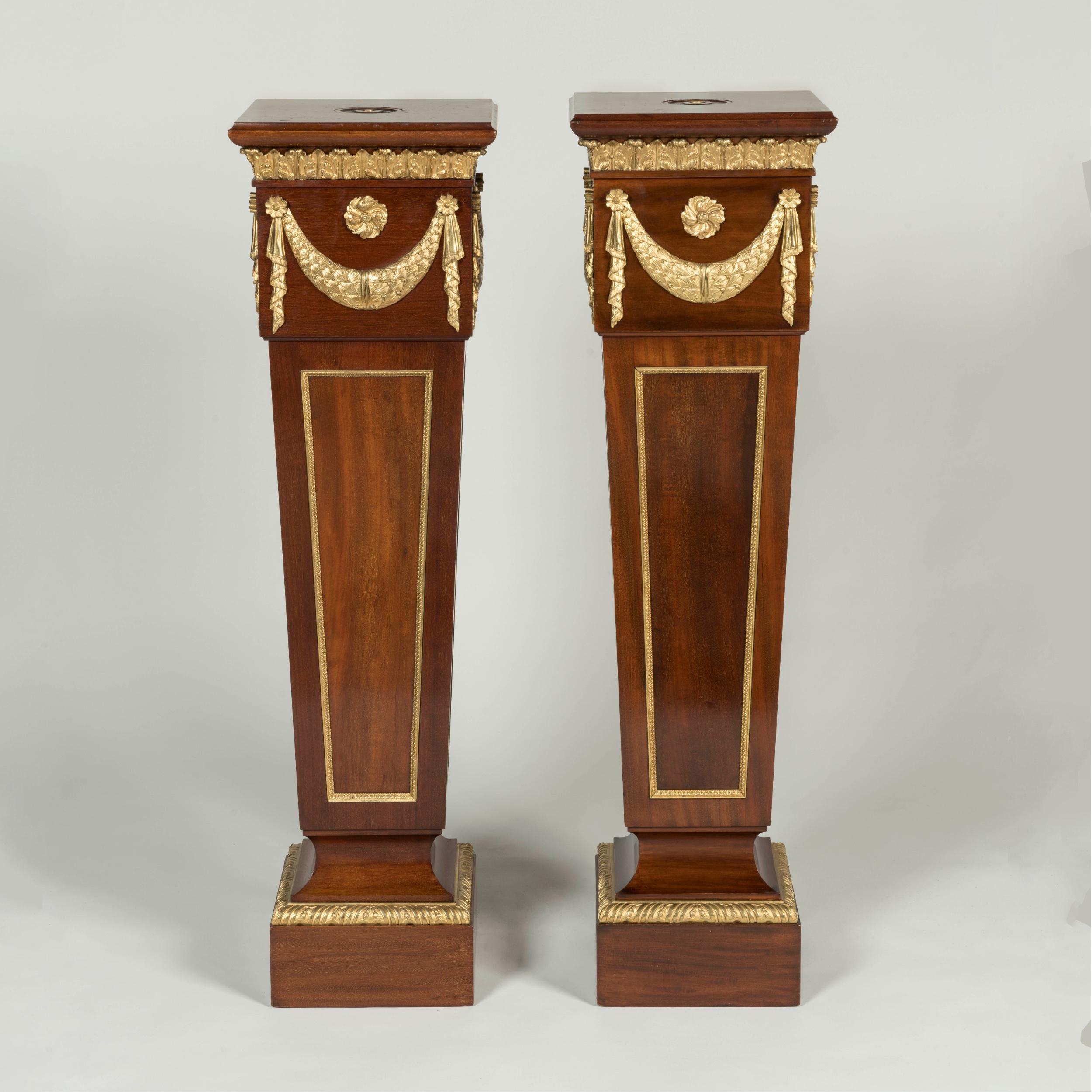 Neoclassical 19th Century Pair of English Ormolu-Mounted Mahogany Pedestals by Trollope For Sale