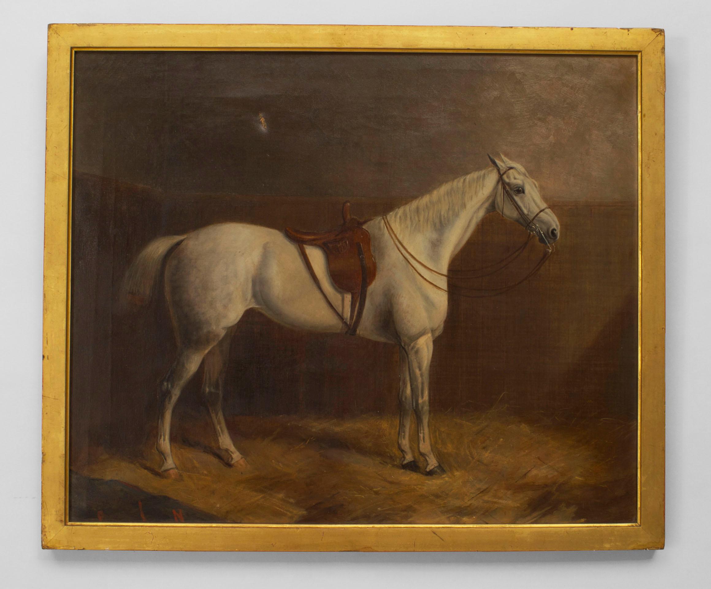 Pair of English Victorian gilt framed oil paintings of white horse with saddle by wall (signed J. PAUL 1873).
 