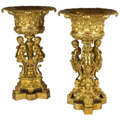 Pair of Figural Gilt Bronze Tazzas Supported by Three Cherubs