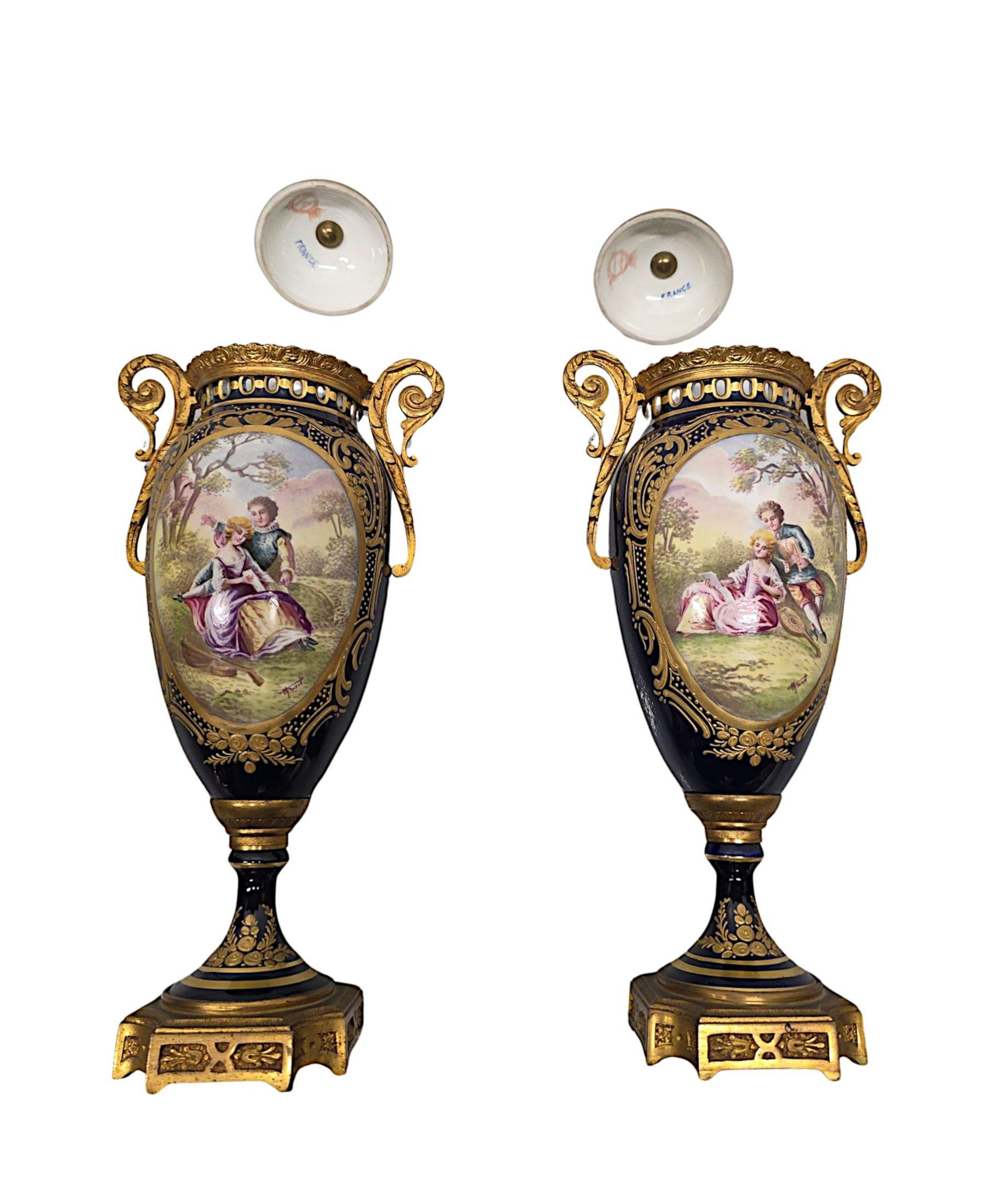 19th Century  Pair of Fine Hand Painted Sevres Style Lidded Urns For Sale 5