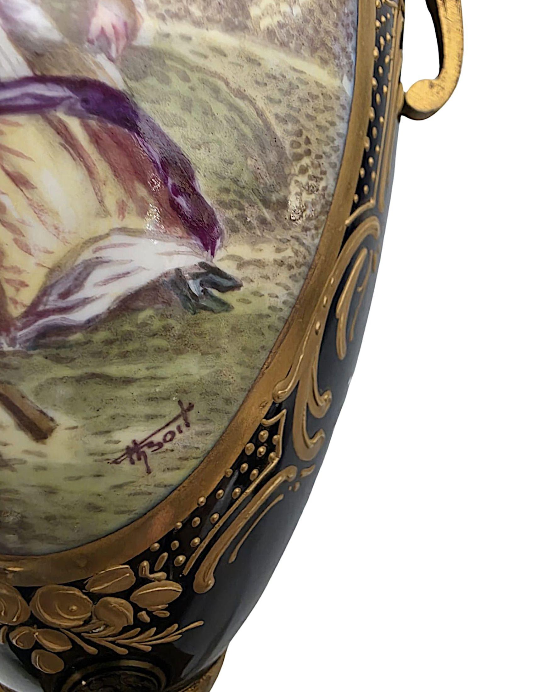 French 19th Century  Pair of Fine Hand Painted Sevres Style Lidded Urns For Sale