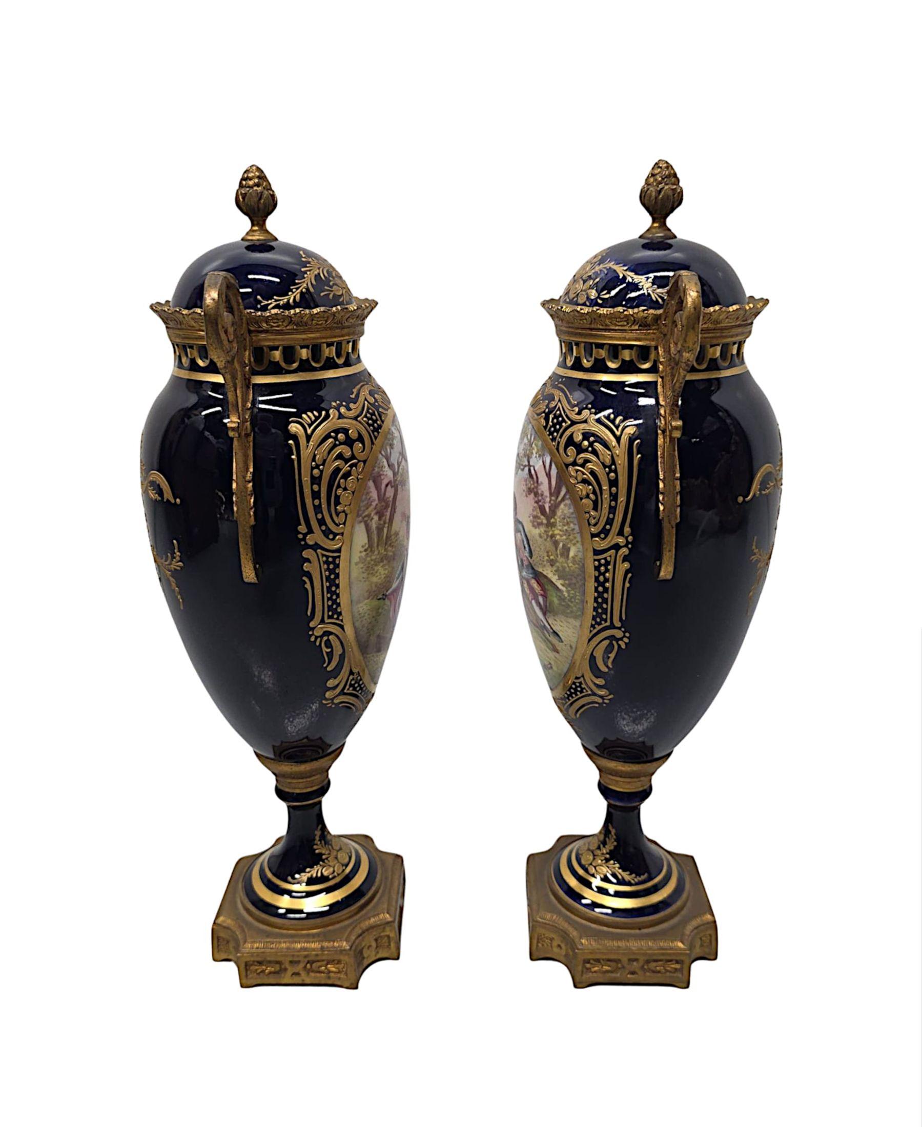 Porcelain 19th Century  Pair of Fine Hand Painted Sevres Style Lidded Urns For Sale