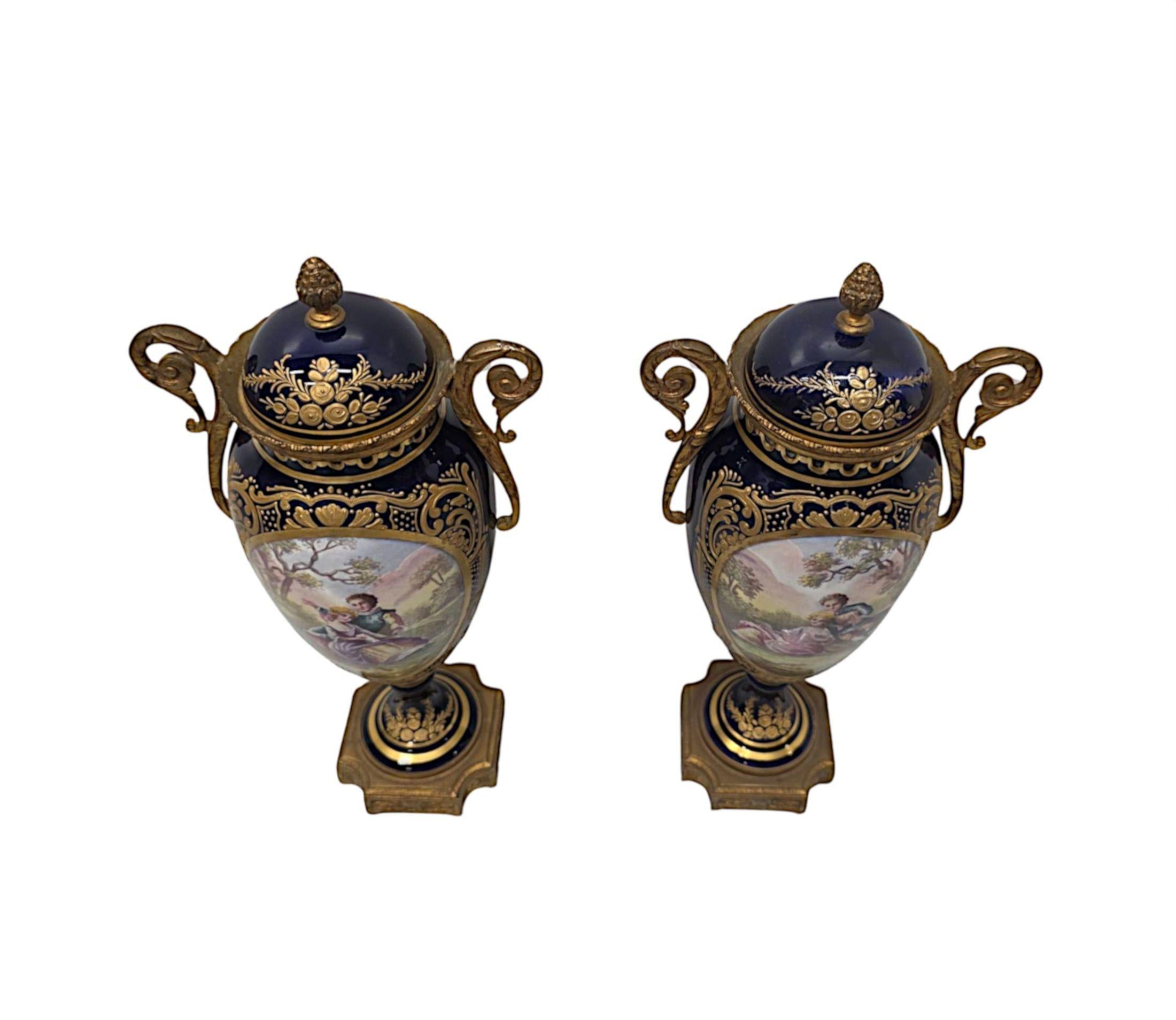 19th Century  Pair of Fine Hand Painted Sevres Style Lidded Urns For Sale 1