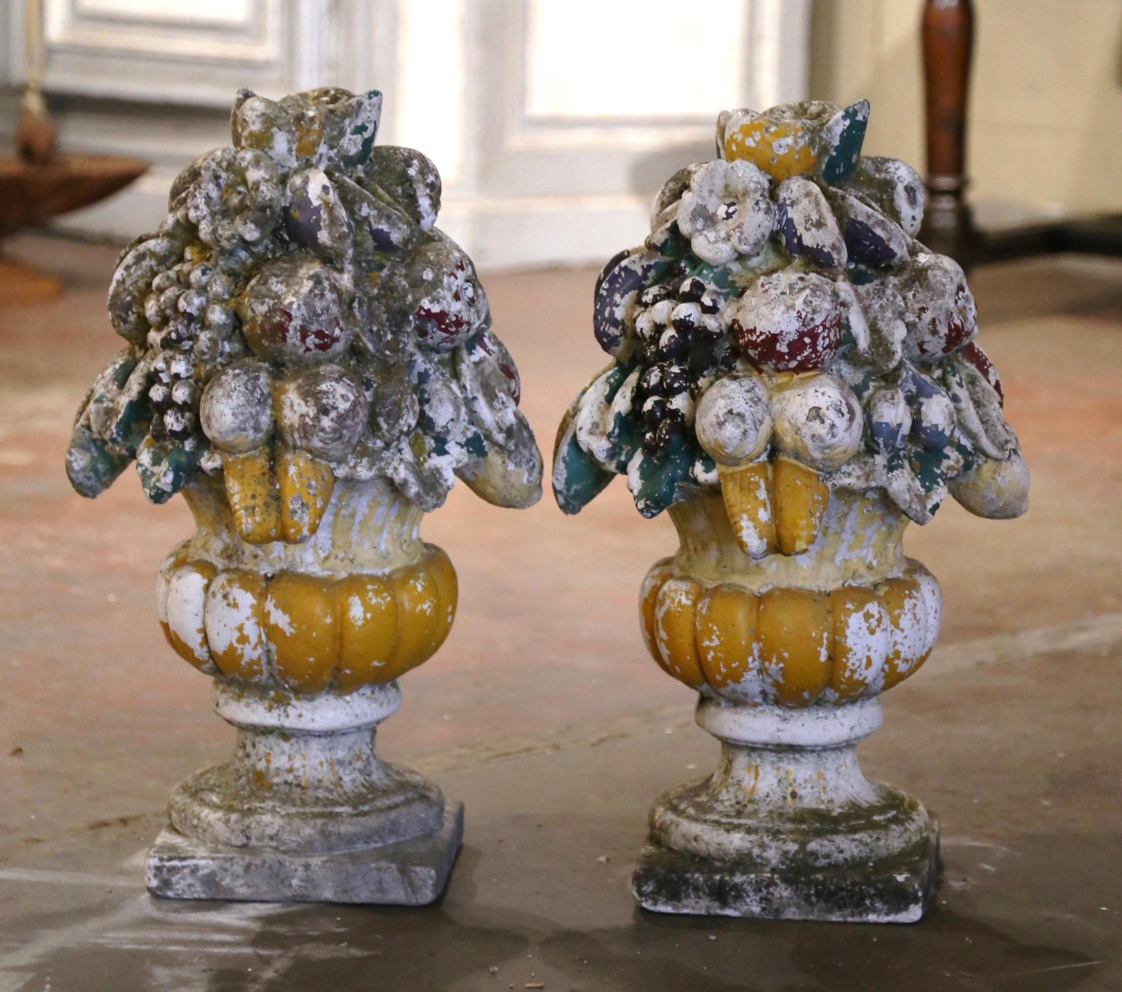 Hand-Carved 19th Century Pair of French Carved Weathered Outdoor Vases with Fruit Decor For Sale