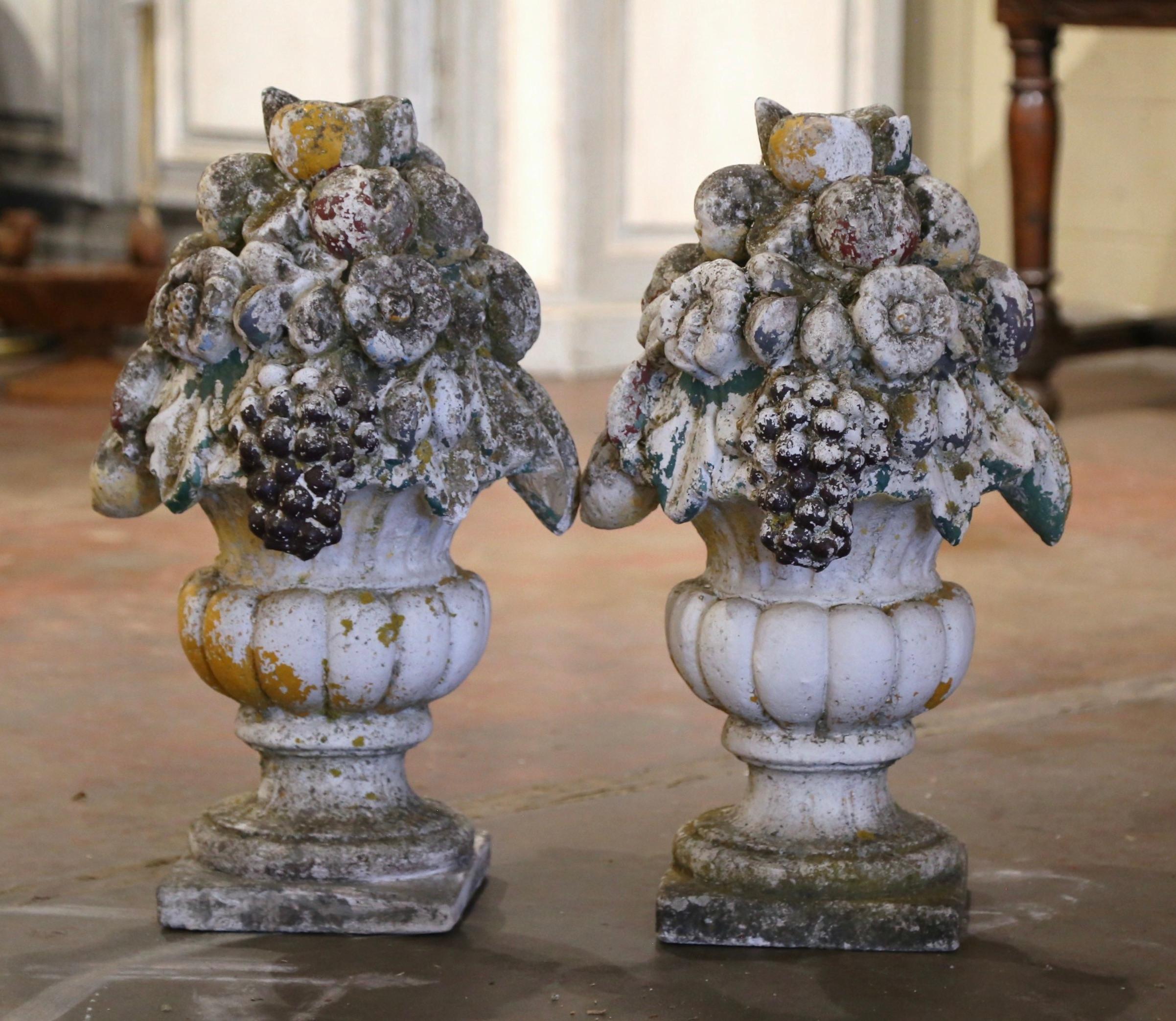 Concrete 19th Century Pair of French Carved Weathered Outdoor Vases with Fruit Decor For Sale
