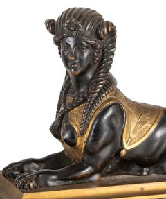 Paar französische Empire-Skulpturen aus vergoldeter und patinierter Bronze des 19. Jahrhunderts mit Sphinxe