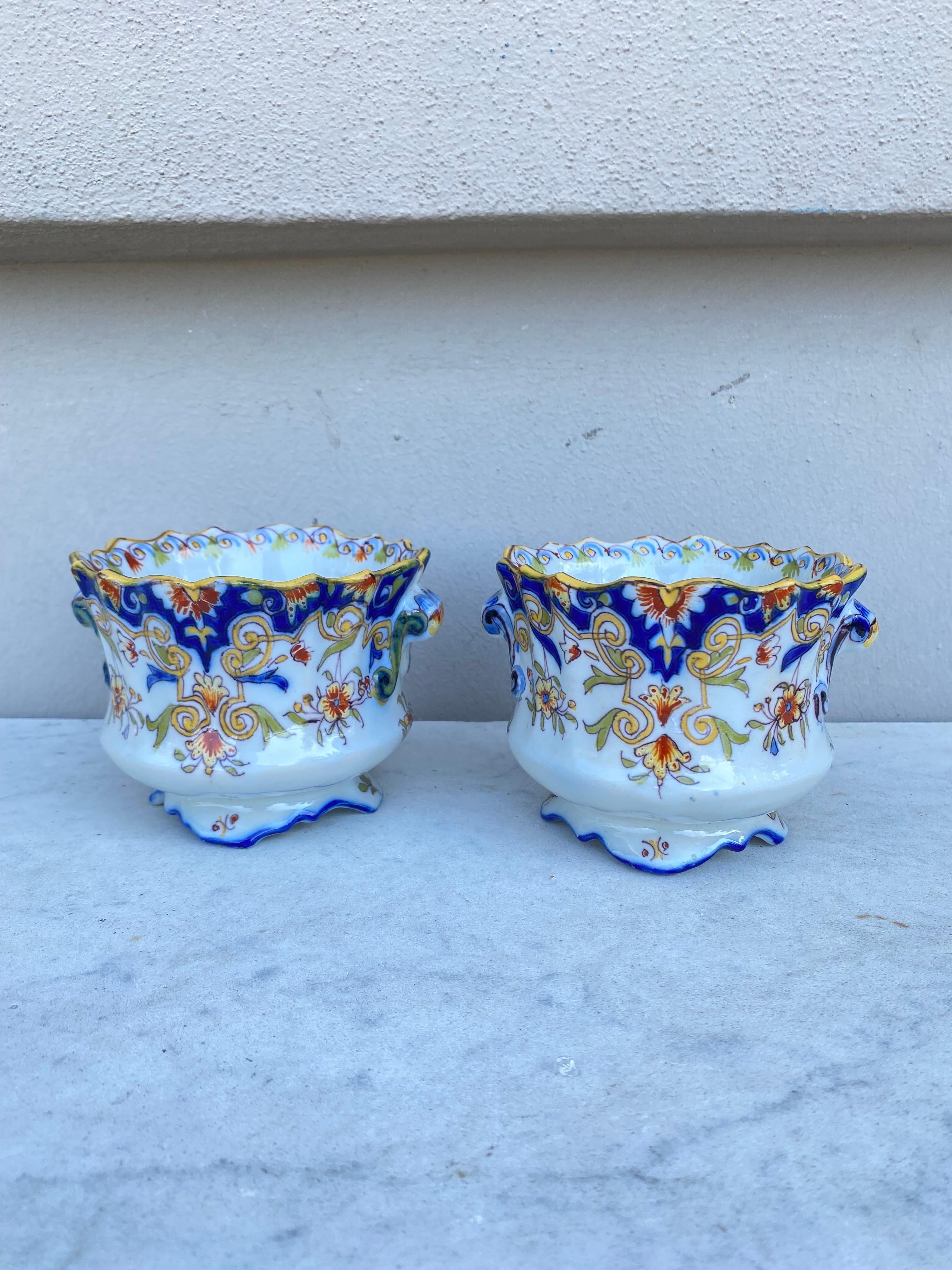 19th Century Pair Of French Faience Cache Pots Desvres , hand painted with flowers on one side and coat of arms on the other side.