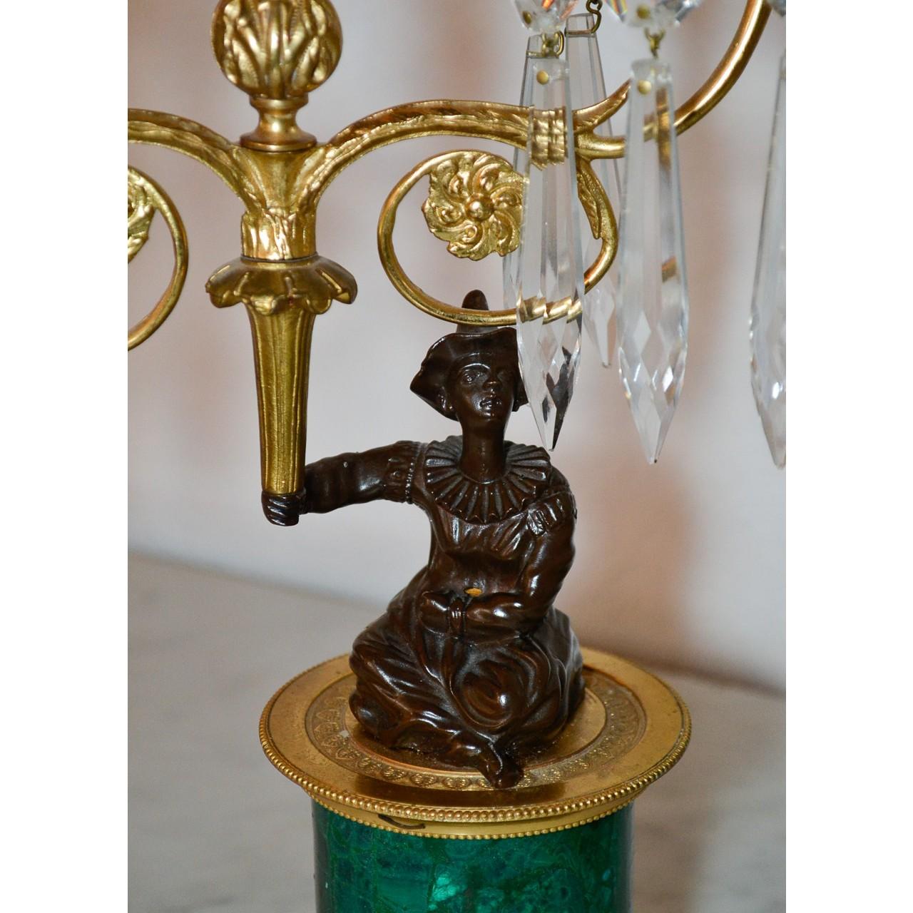 Gorgeous pair of figural bronze and natural malachite candelabras with crystal drops.
Made in France, circa 1880.
Napoleon III era.