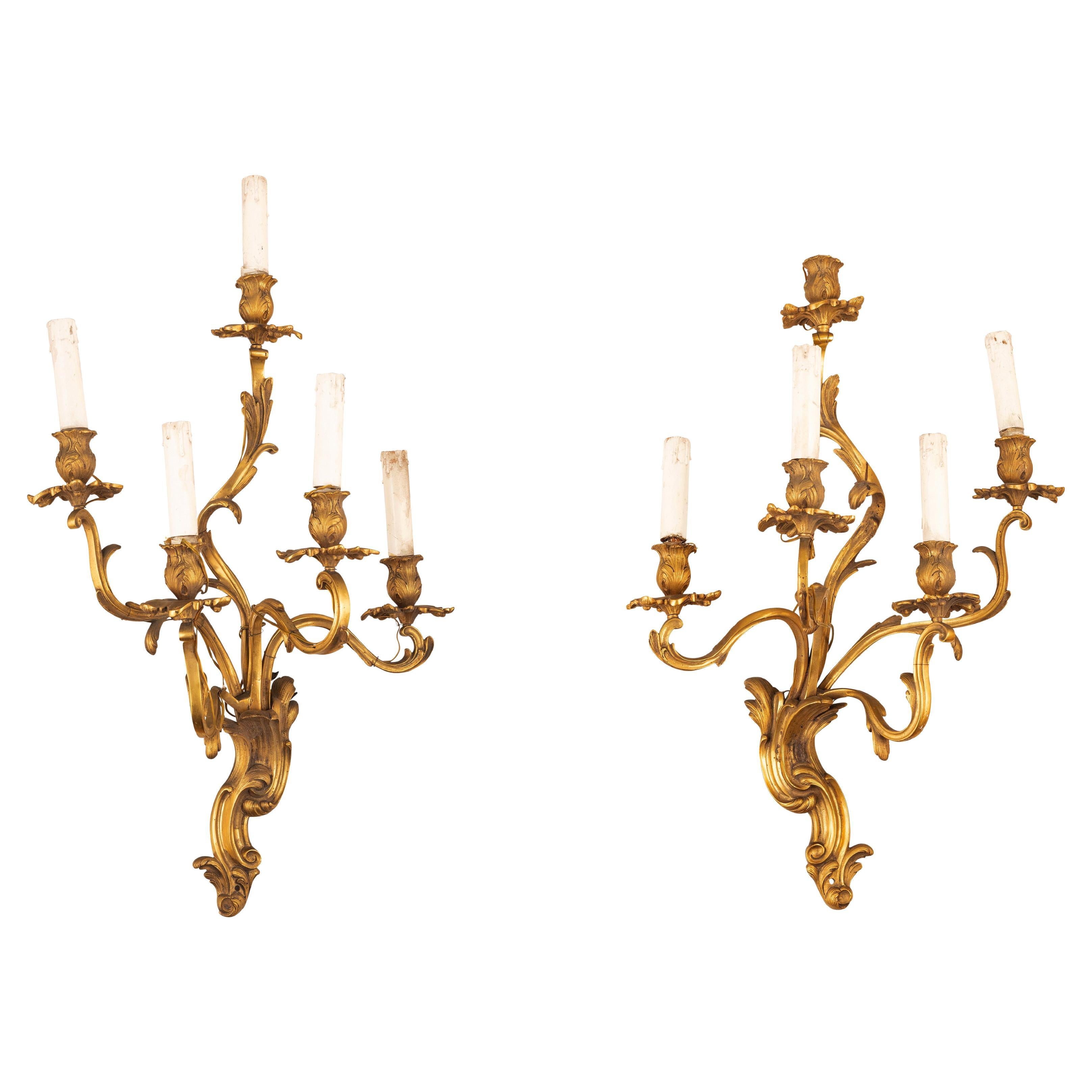 19ème siècle, Paire de lampes à quatre lumières en bronze doré. en vente