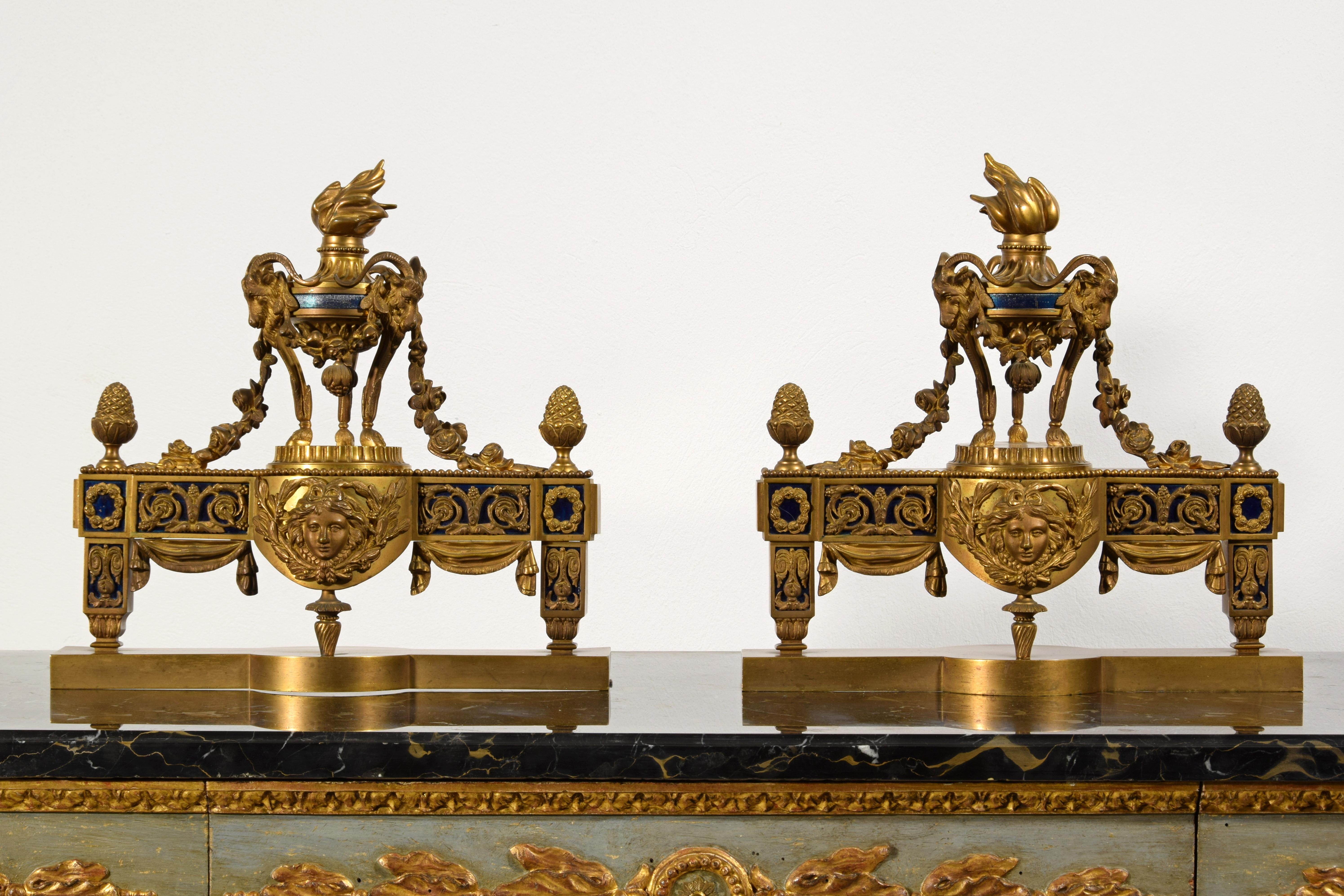 19th Century, pair of French gilt bronze fireplace chenets.

This valuable pair of Fireplace Chenets was made in France in the early nineteenth century. The Fireplace Chenets are in finely chiselled and gilded bronze and have ornate decorations