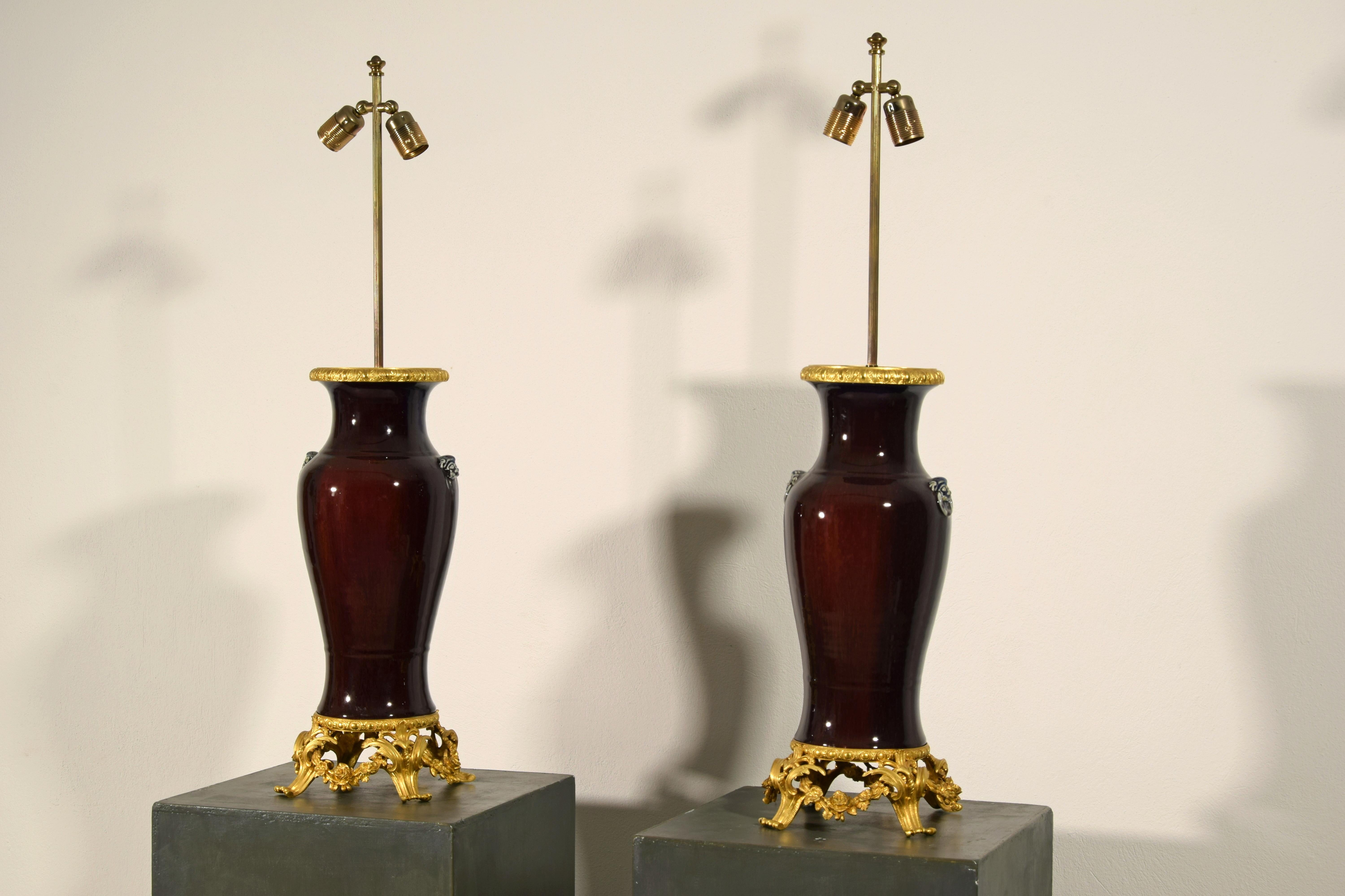 19th Century Pair of French Lamps with Chinese Ceramic Vase 

This particular pair of lamps was made with the use of ceramic vases, made in China in the nineteenth century and mounted, also in the nineteenth century, on a base of finely chiselled