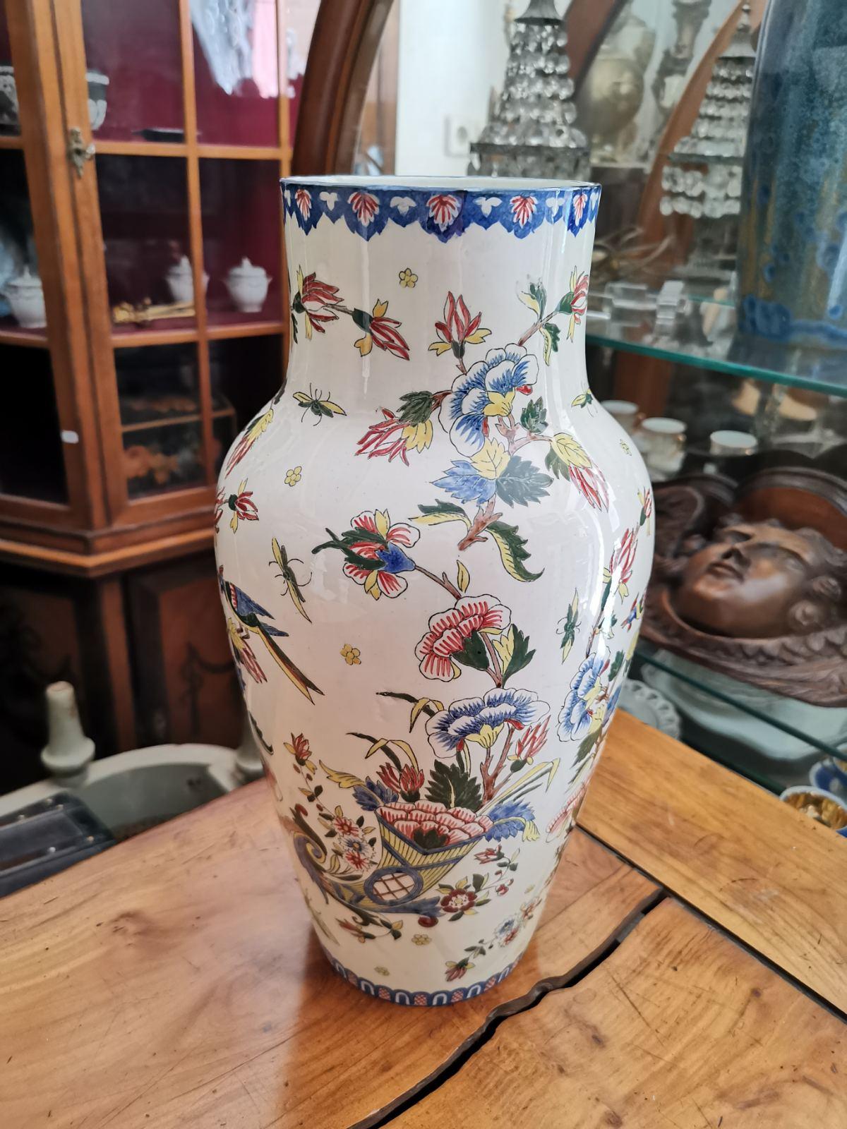 Pair of beautiful French large hand painted ceramic vases marked and numbered by Gien. Very detailed decoration with birds and flowers in vivid colors.
Great condition with no restaurations.
France, circa 1886.