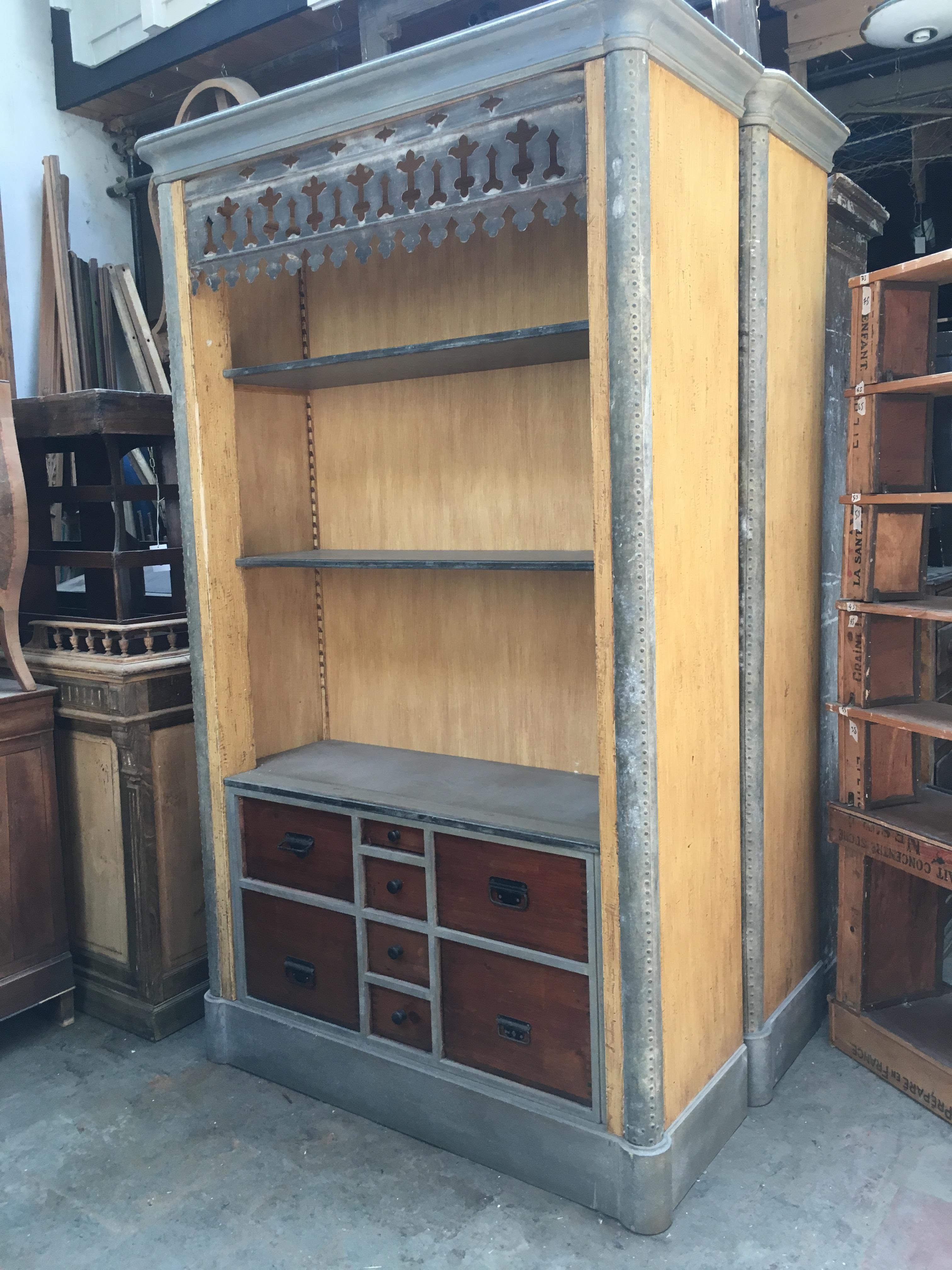 19th century pair of French painted wood cabinet with zinc-coated metal details.
Each cabinet has four big drawers, four small drawers and two adjustable shelves.