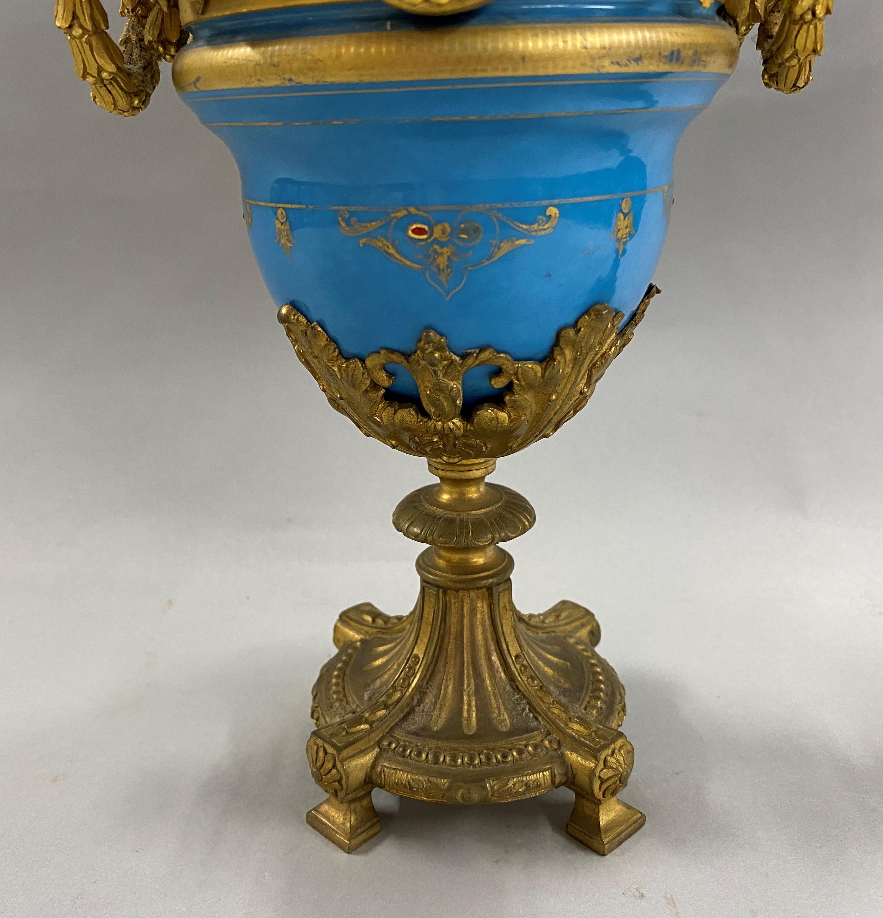 19th Century Pair of French Sevres Celeste Blue Porcelain Urns with Gilt Ormolu 1