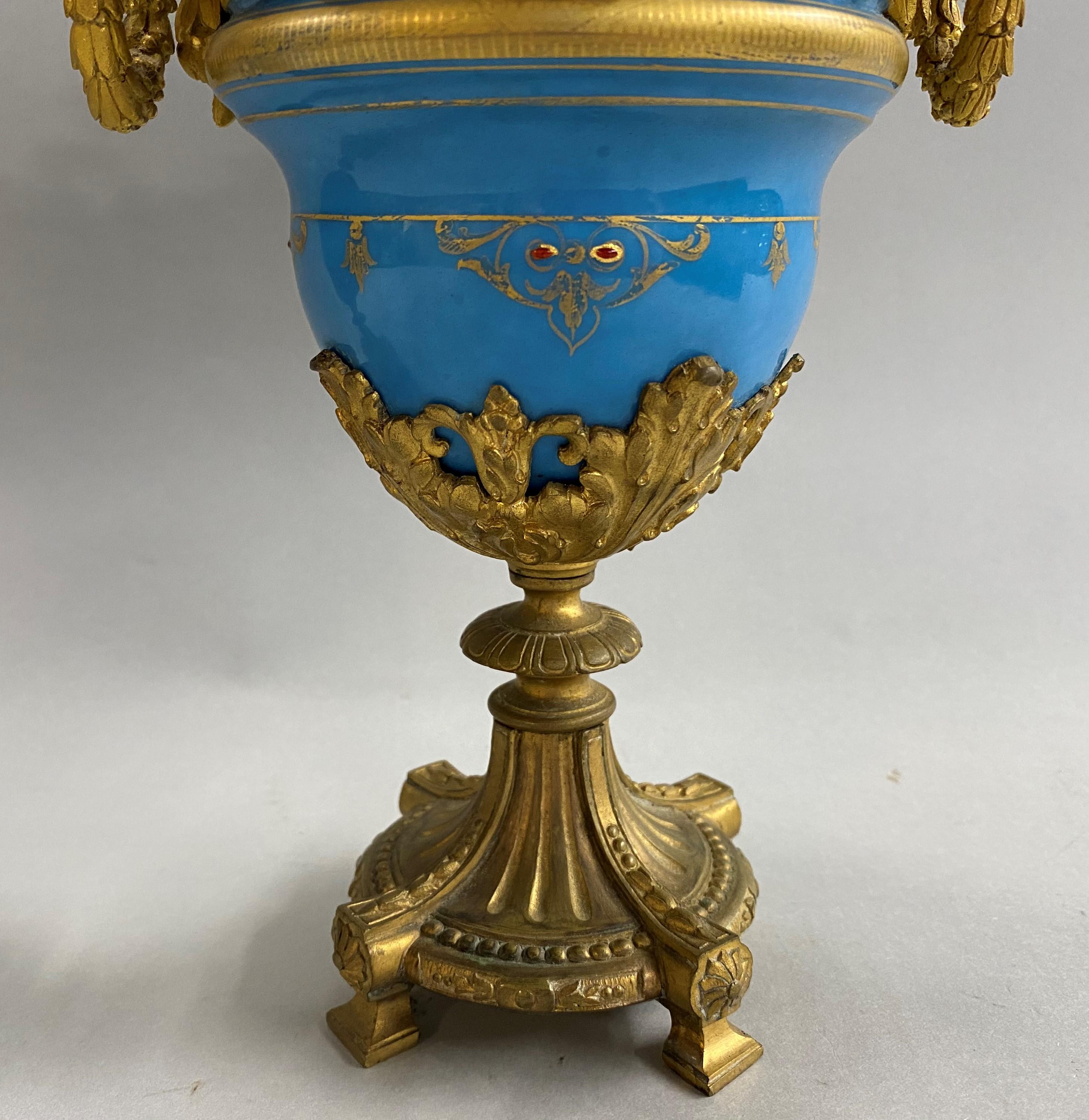 19th Century Pair of French Sevres Celeste Blue Porcelain Urns with Gilt Ormolu 4