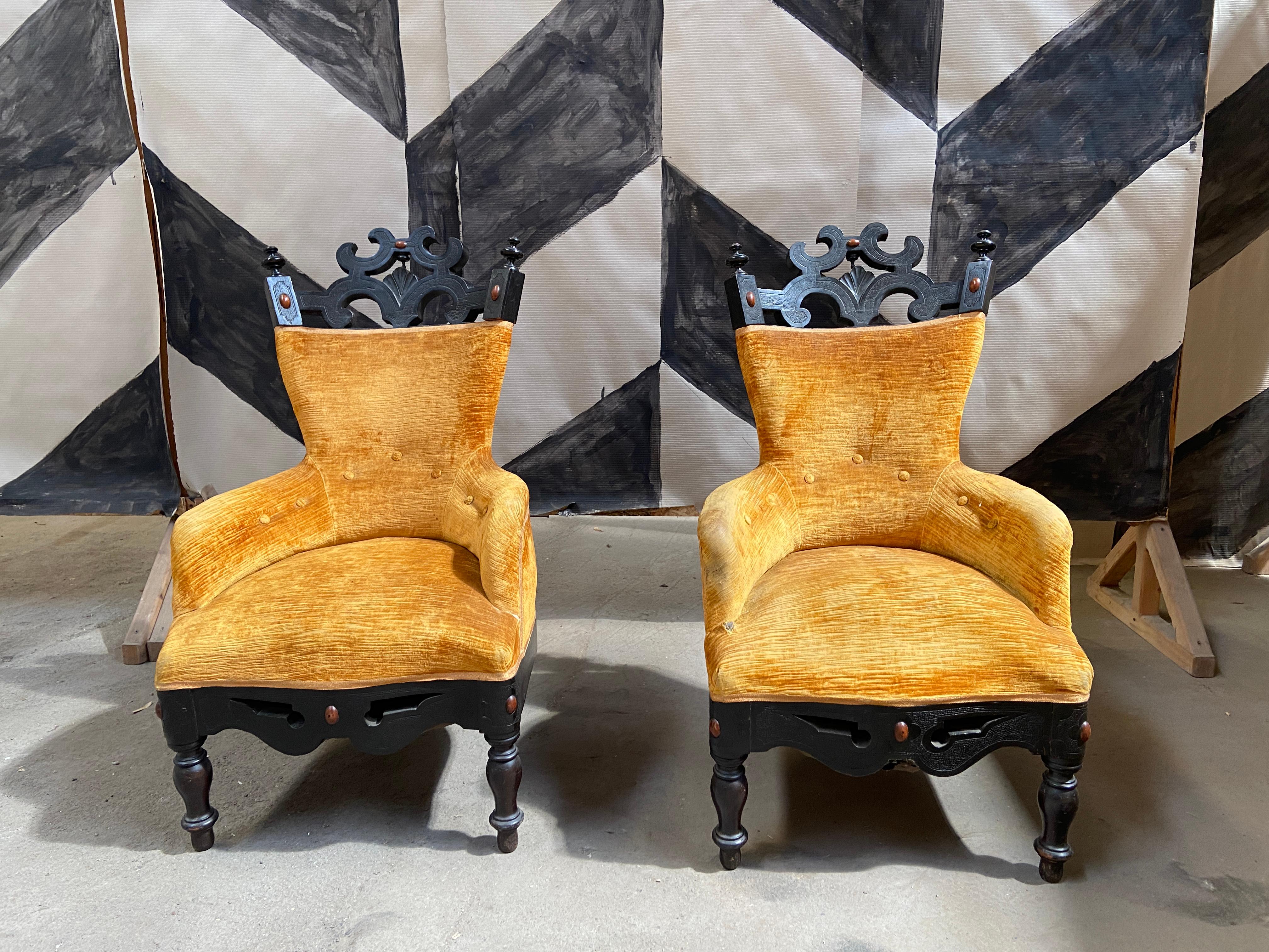 19th Century Pair of Anglo-Indian rare armchairs in ebonized wood with original moire velvet.
     