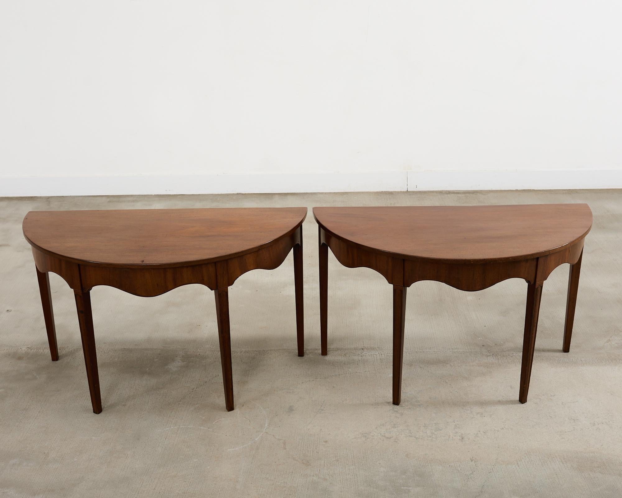 Hand-Crafted 19th Century Pair of George III Mahogany Demilune Console Tables For Sale