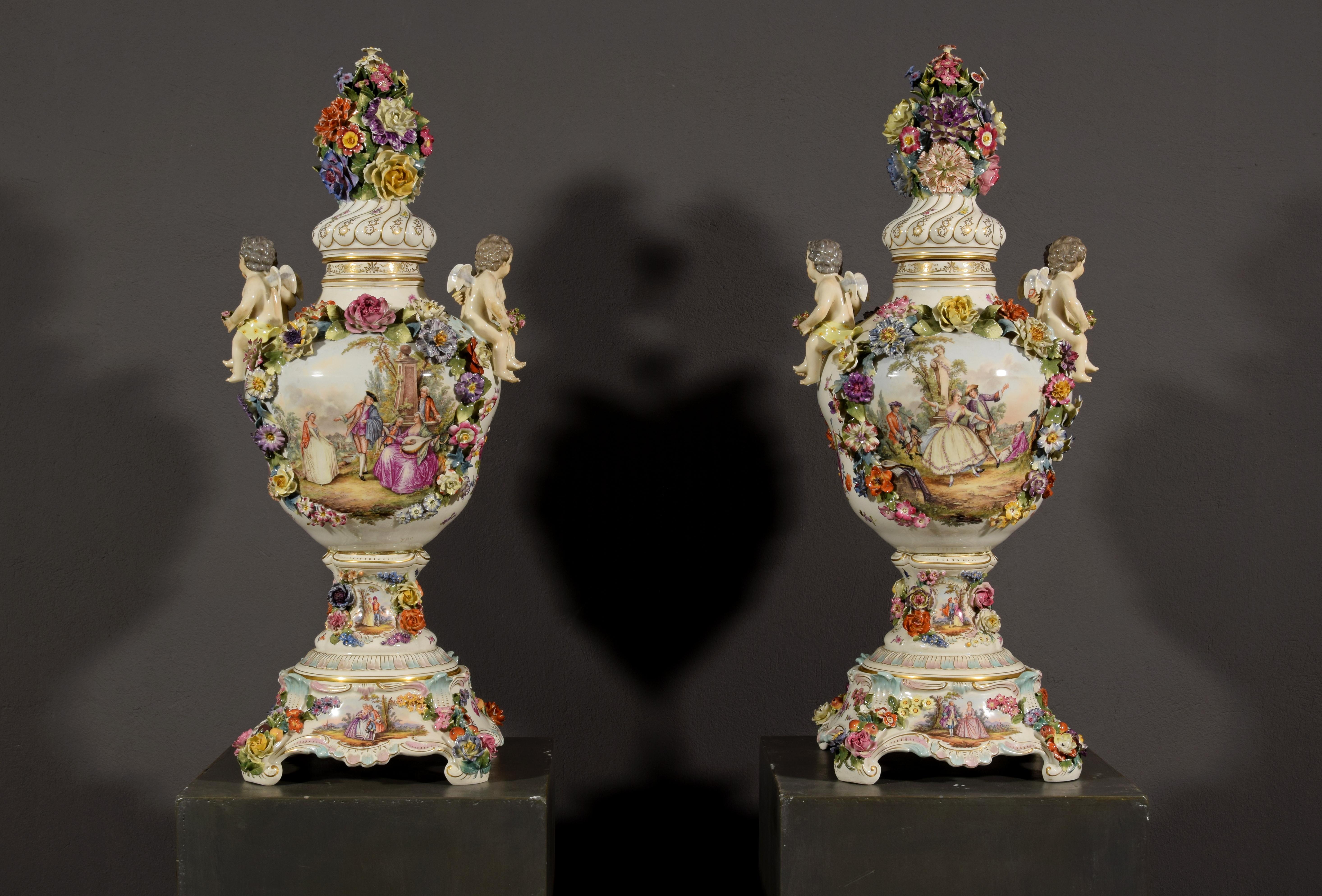 19th century pair of German polychrome porcelain vases
Measurements: cm H 86,5 x W 35 x D 31; base cm 31 x 31
blue color mark 

This delightful pair of beautiful vases was made in the nineteenth century in Germany. Entirely in porcelain, the