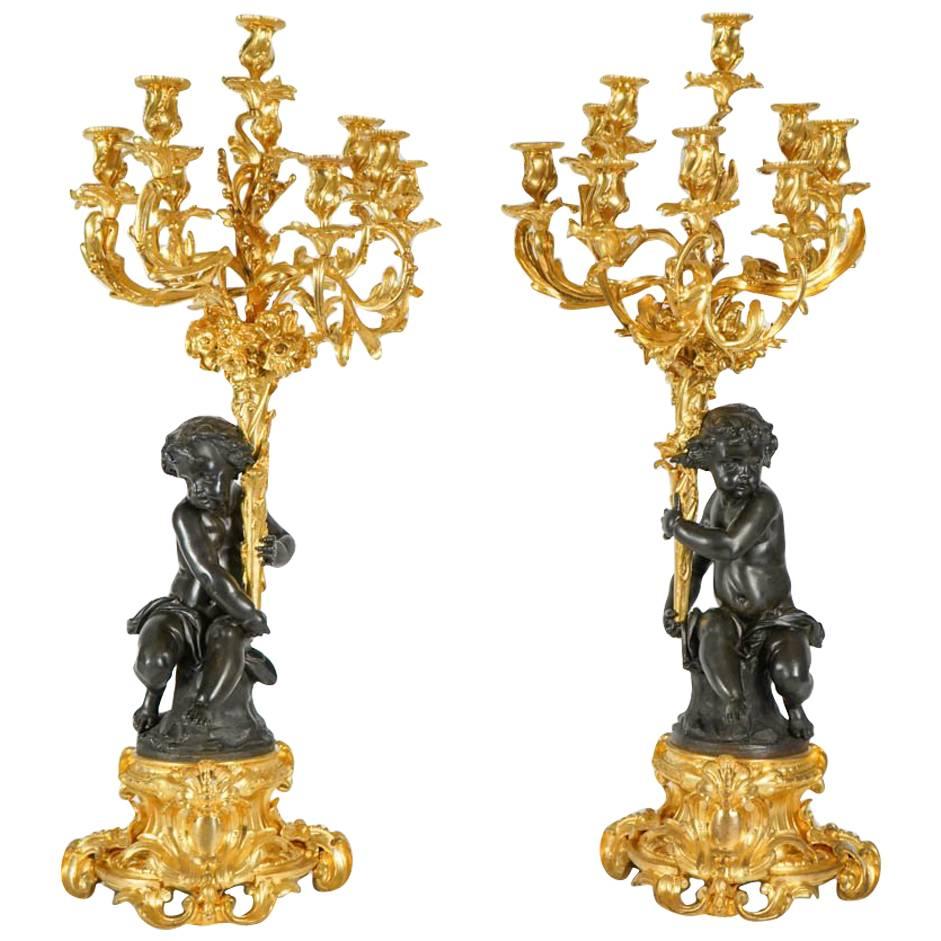 19th Century Pair of Gilt and Patinated Bronze Candelabras