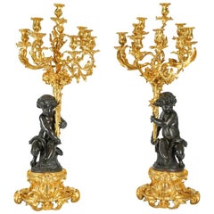 19th Century Pair of Gilt and Patinated Bronze Candelabras