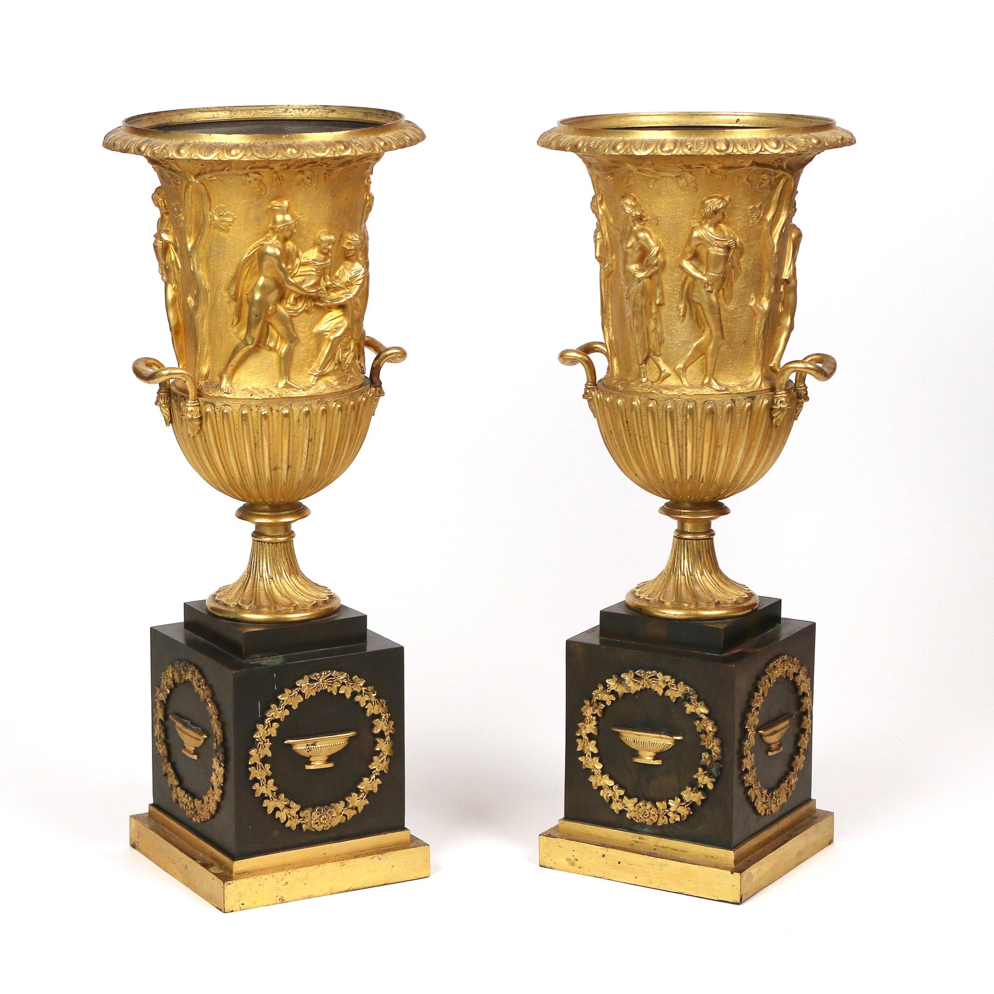 French 19th Century Pair of Gilt Bronze and Black Onyx Neoclassical Urns For Sale