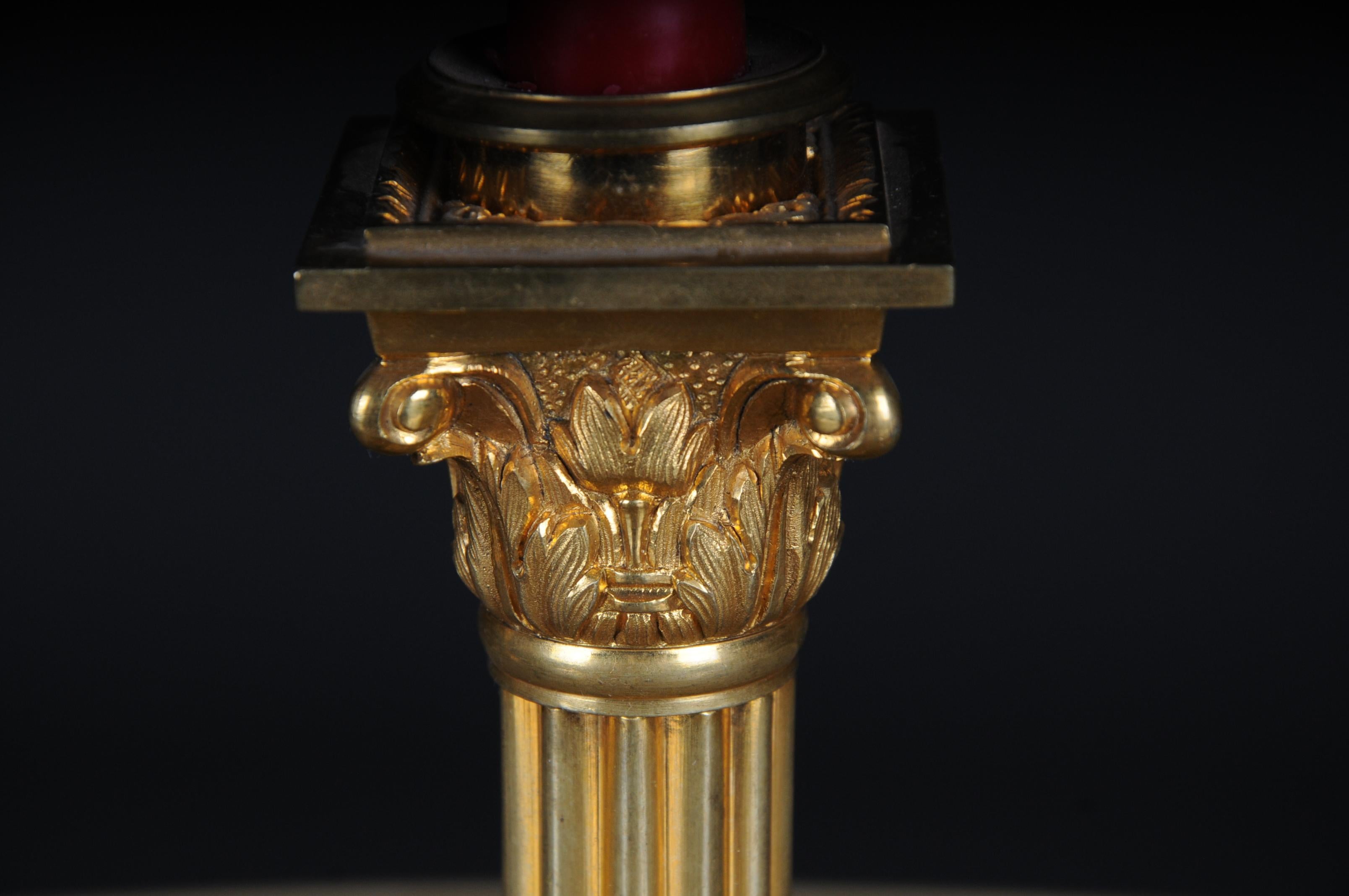 Gilt 19th Century Pair of gilt bronze candlesticks