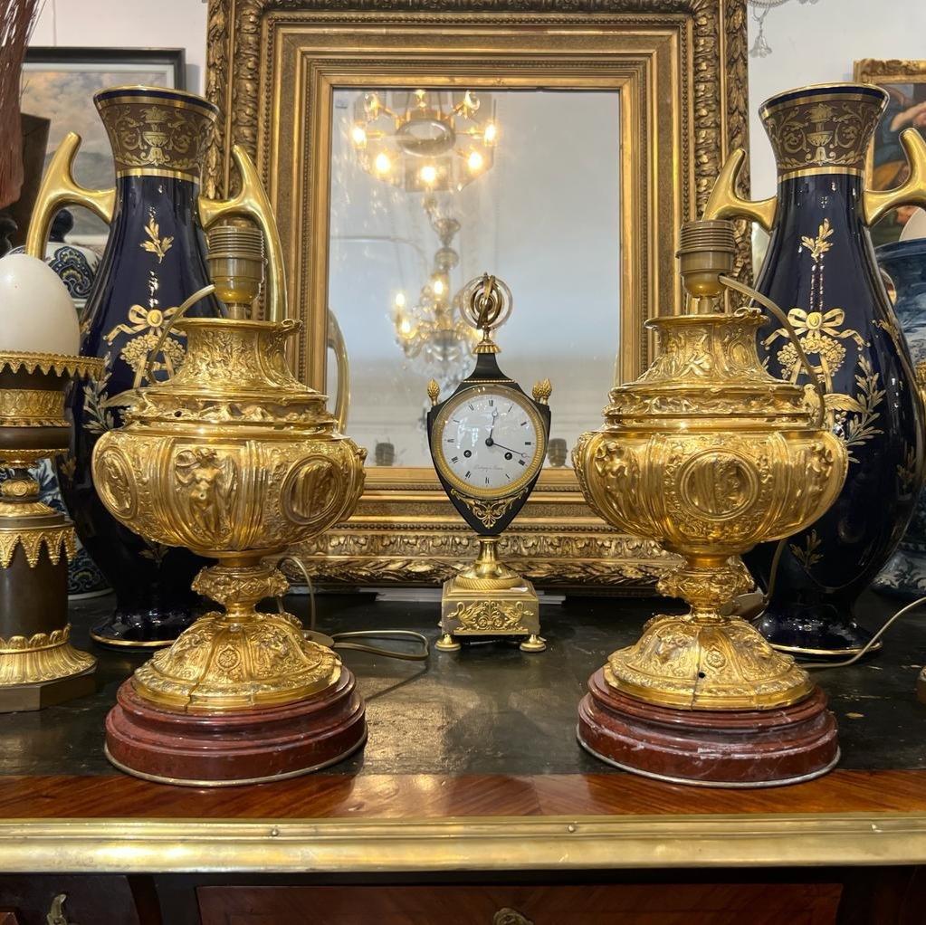 French 19th Century Pair of Gilt Bronze Lamps with Red Griotte Marble Bases For Sale