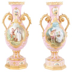 Paire d'urnes/vases décoratifs en porcelaine dorée du 19ème siècle