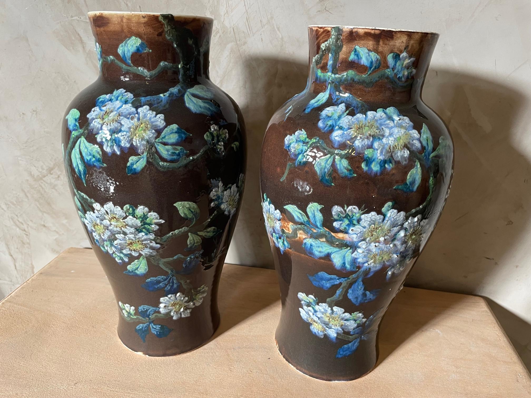 Beautiful pair of 19th century French Longchamp glazed ceramic vases from the 1890s. Exceptional blue and white flower decoration. 
Stamped 