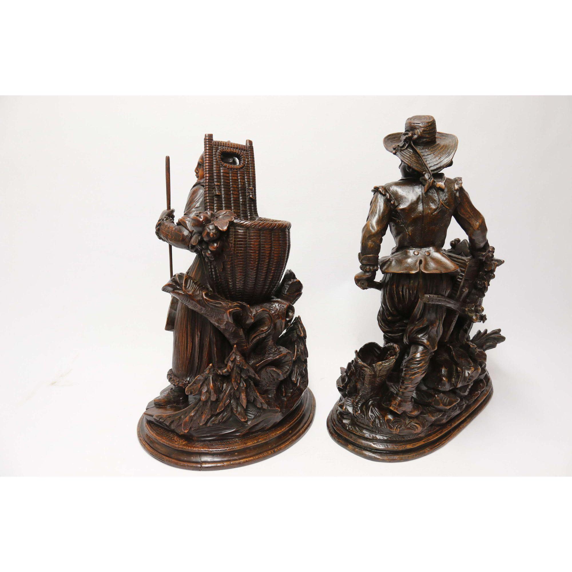 Wood 19th century pair of horticultural Black Forest figures, circa 1850 For Sale