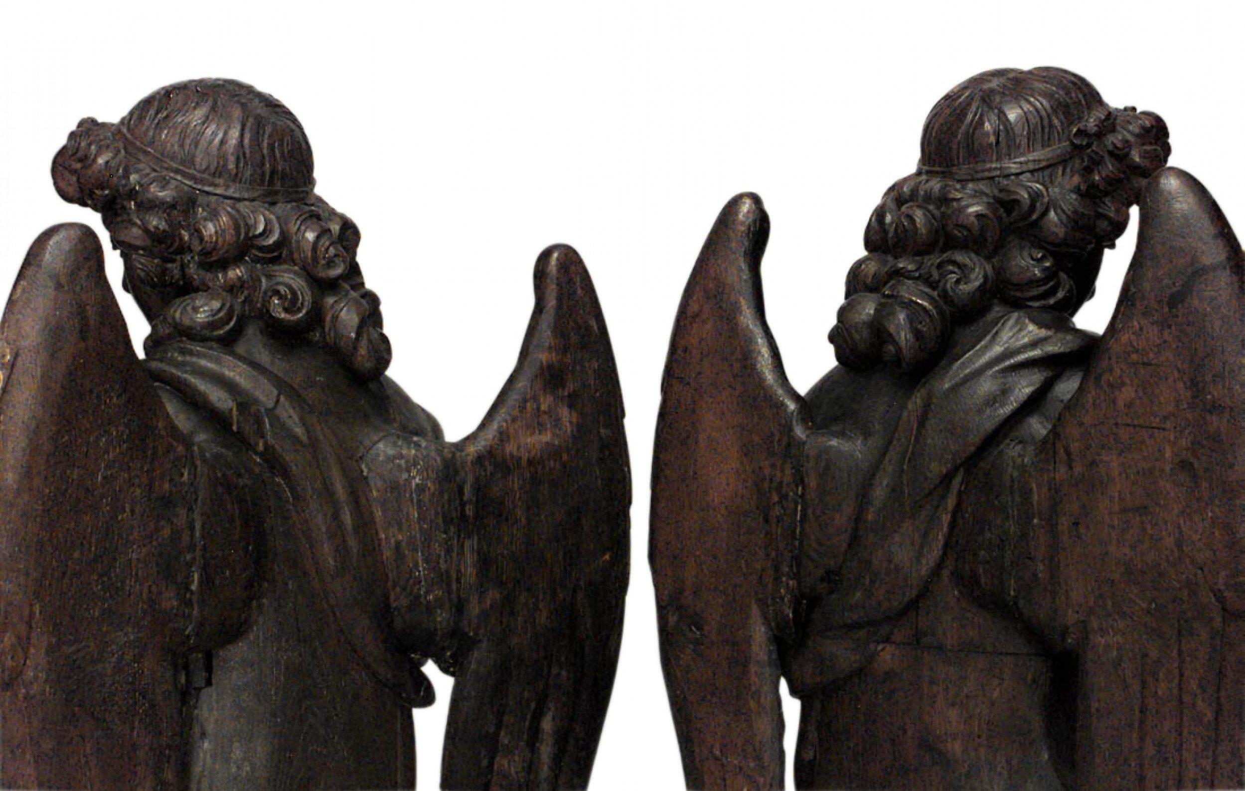 Pair of Italian Renaissance style (19th Century) carved oak large angels with guitars.
 