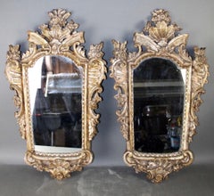 19th Century Pair of Italian Rococo Champaigne Silvered Giltwood Mirrors