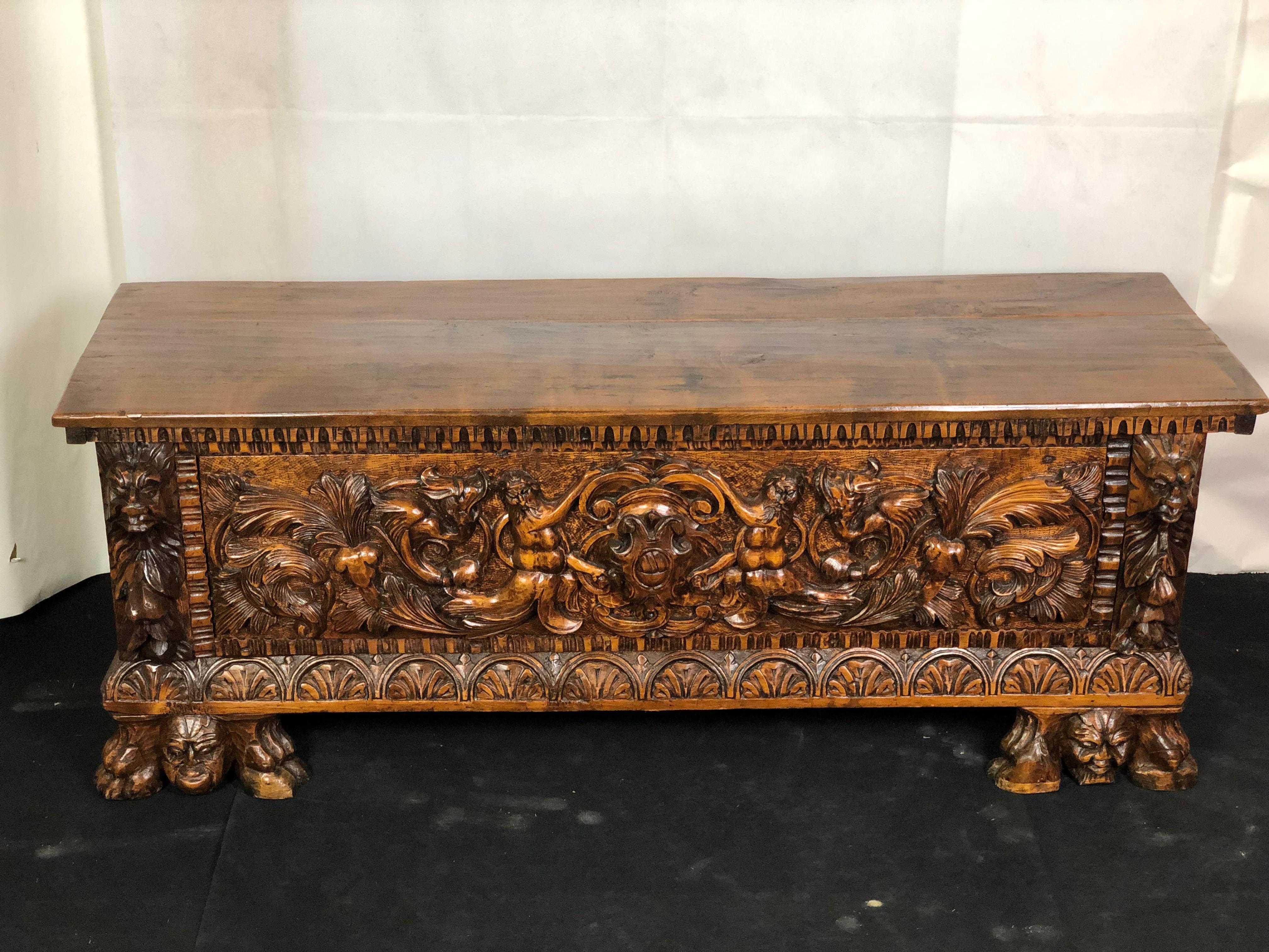Pair of renaissance style chests entirely in carved solid walnut wood, Venetian origin dating back to the end of the 19th century. Dimensions: Height 56 cm, length 146 cm, depth 44 cm in good state.