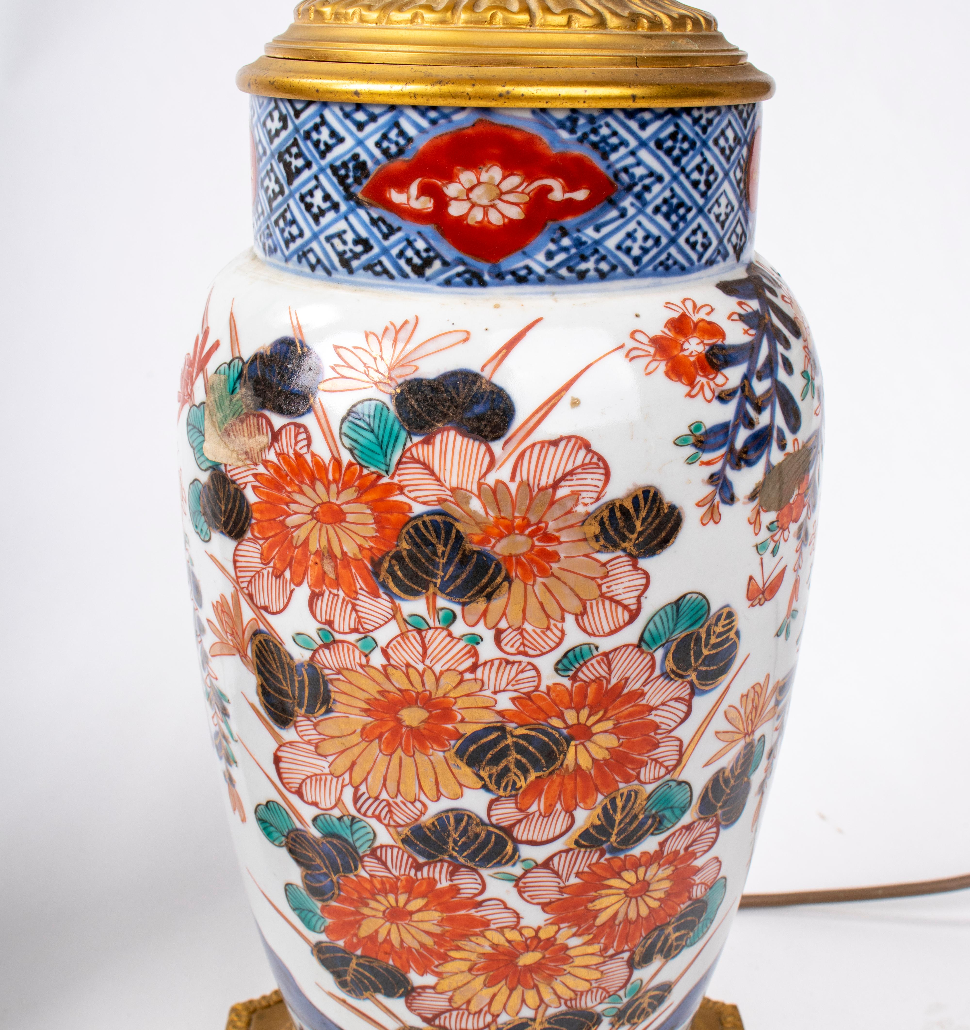 19th century pair of Japanese Imari ware porcelain vases with bronze fittings.