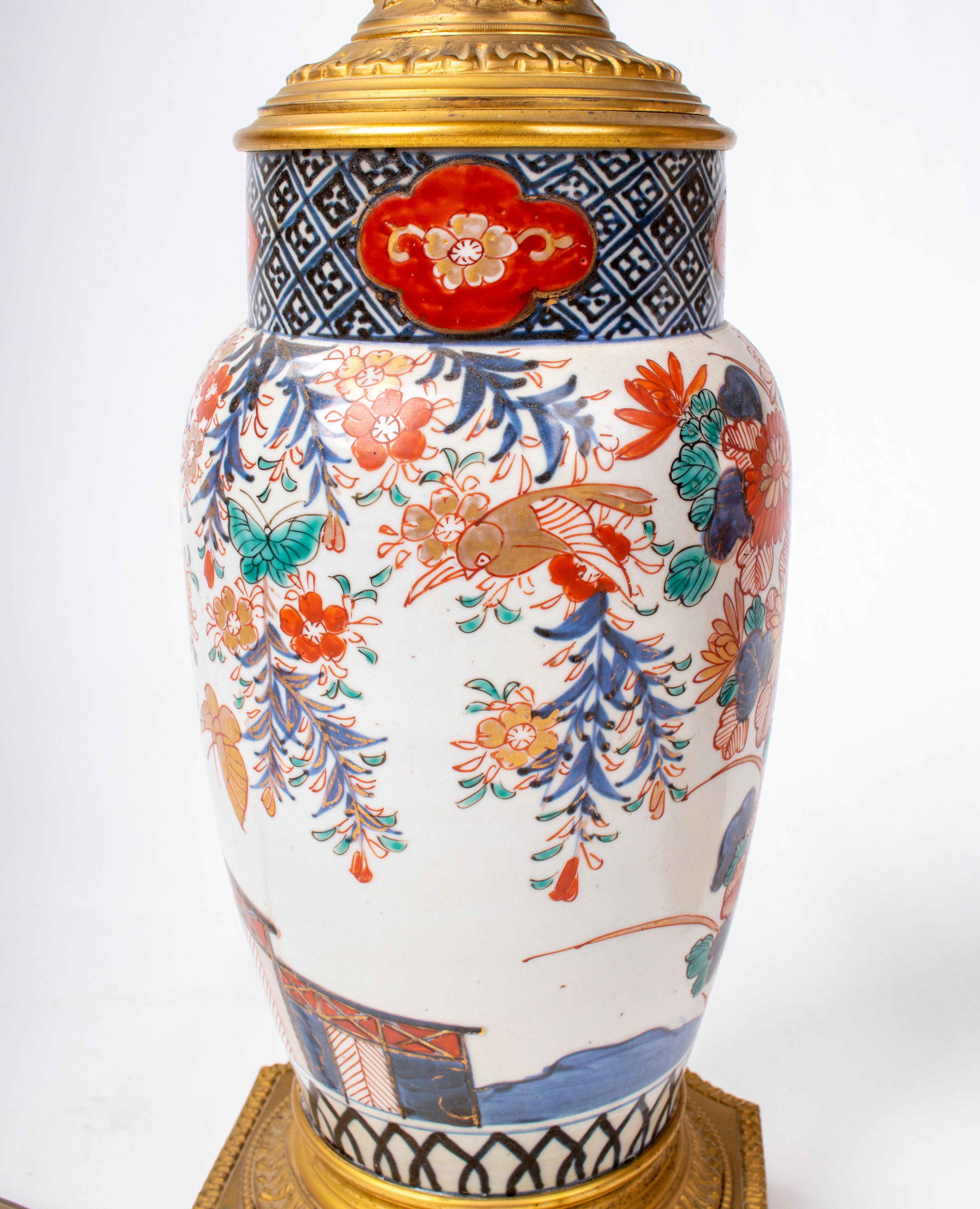 Asian 19th Century Pair of Japanese Imari Ware Porcelain Vases with Bronze Fittings