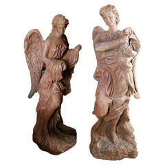 Paire de grandes statues d'anges en fonte du 19ème siècle
